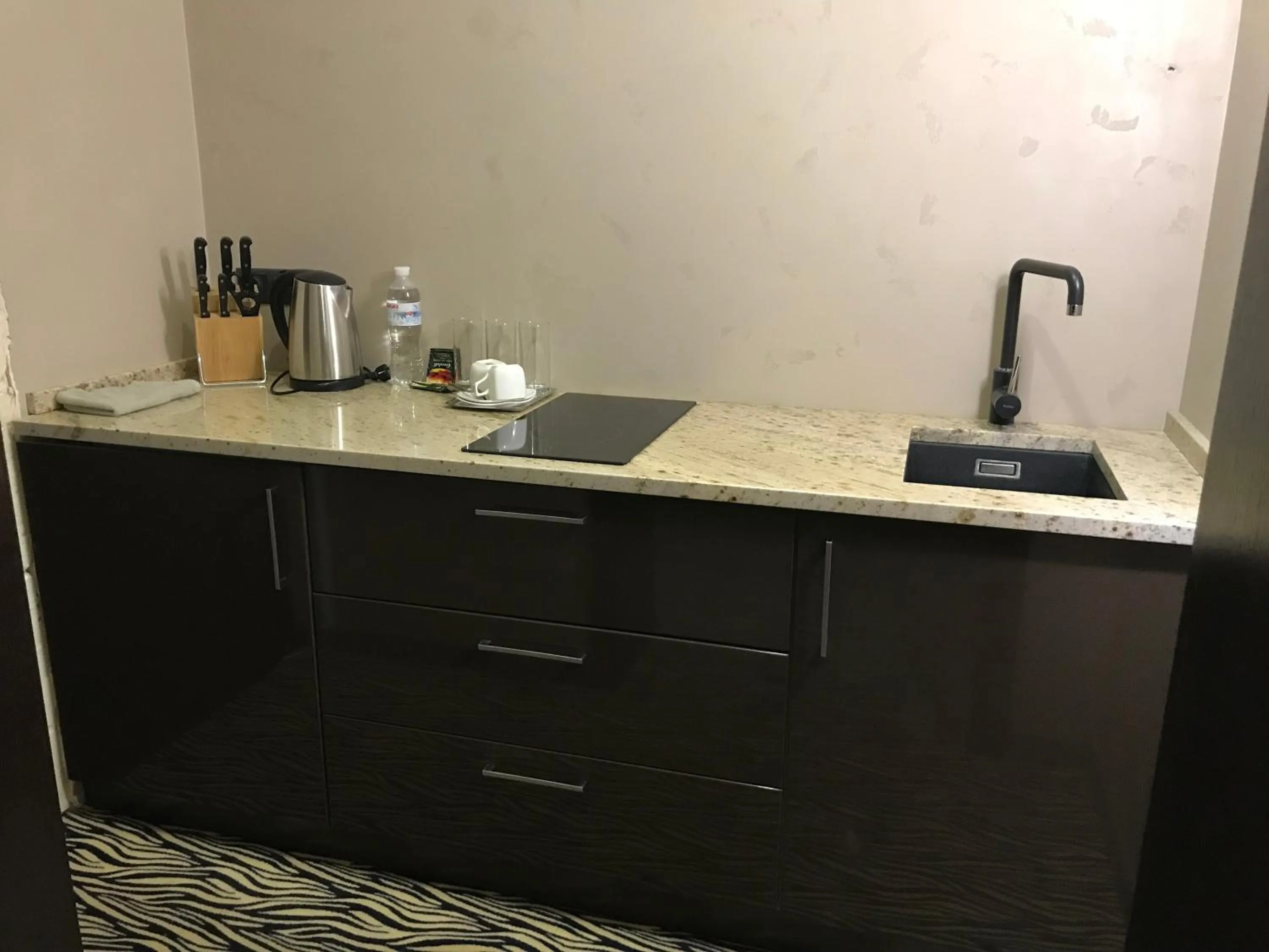 Kitchen or kitchenette in ArtApart Vozdvigenka