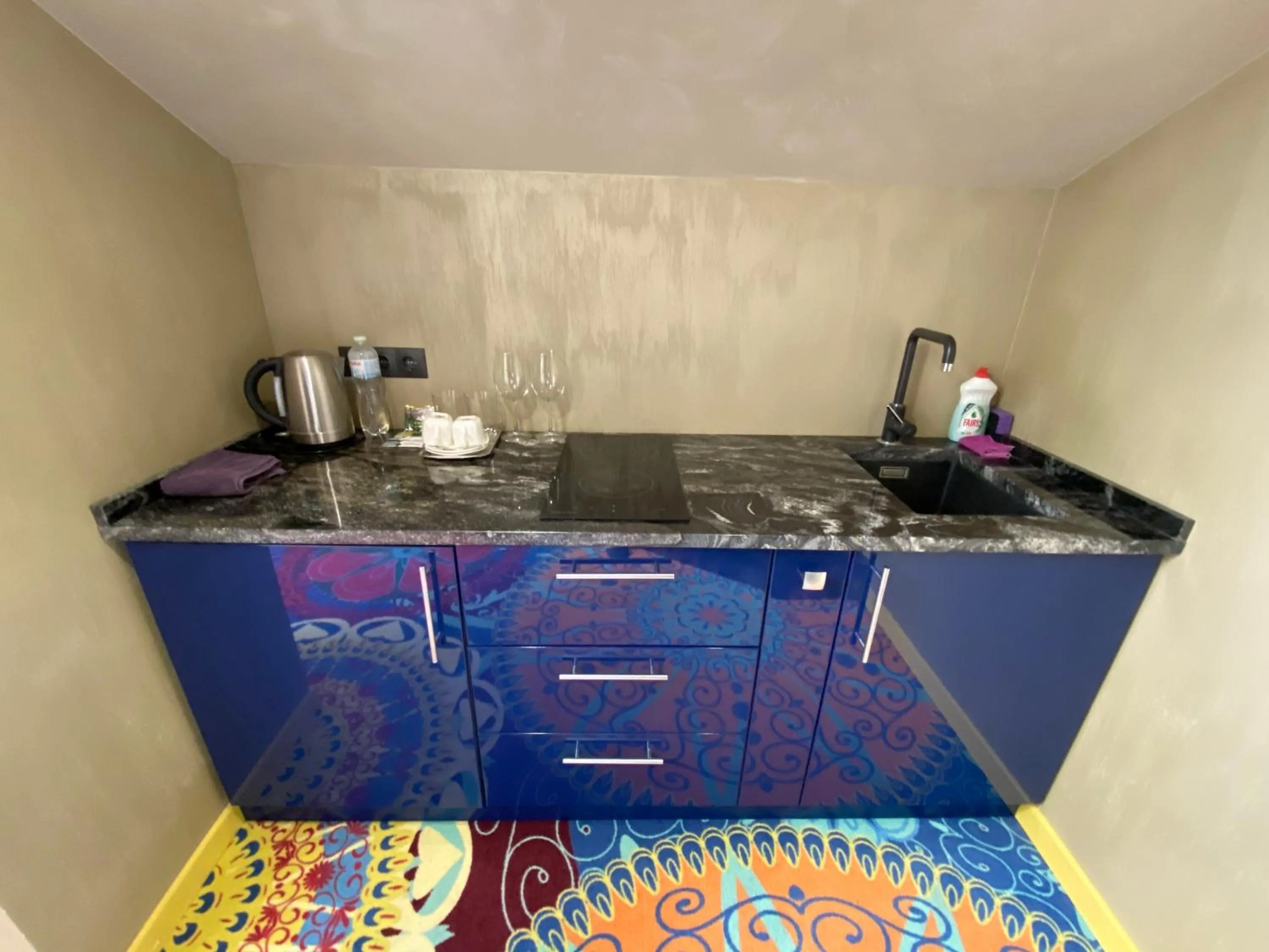 Kitchen or kitchenette in ArtApart Vozdvigenka