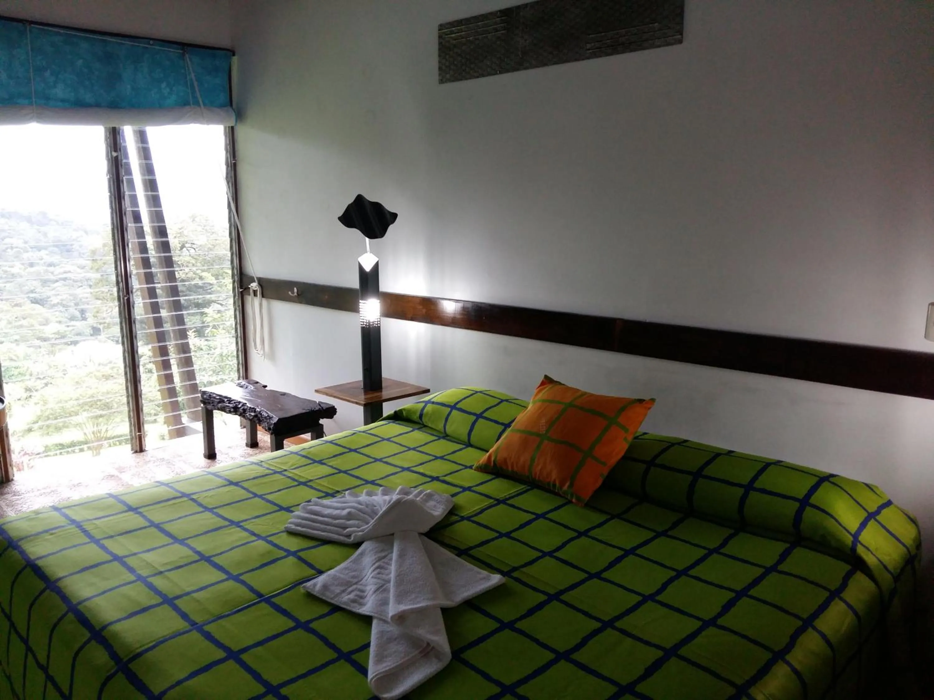 Bed in Celeste Mountain Lodge