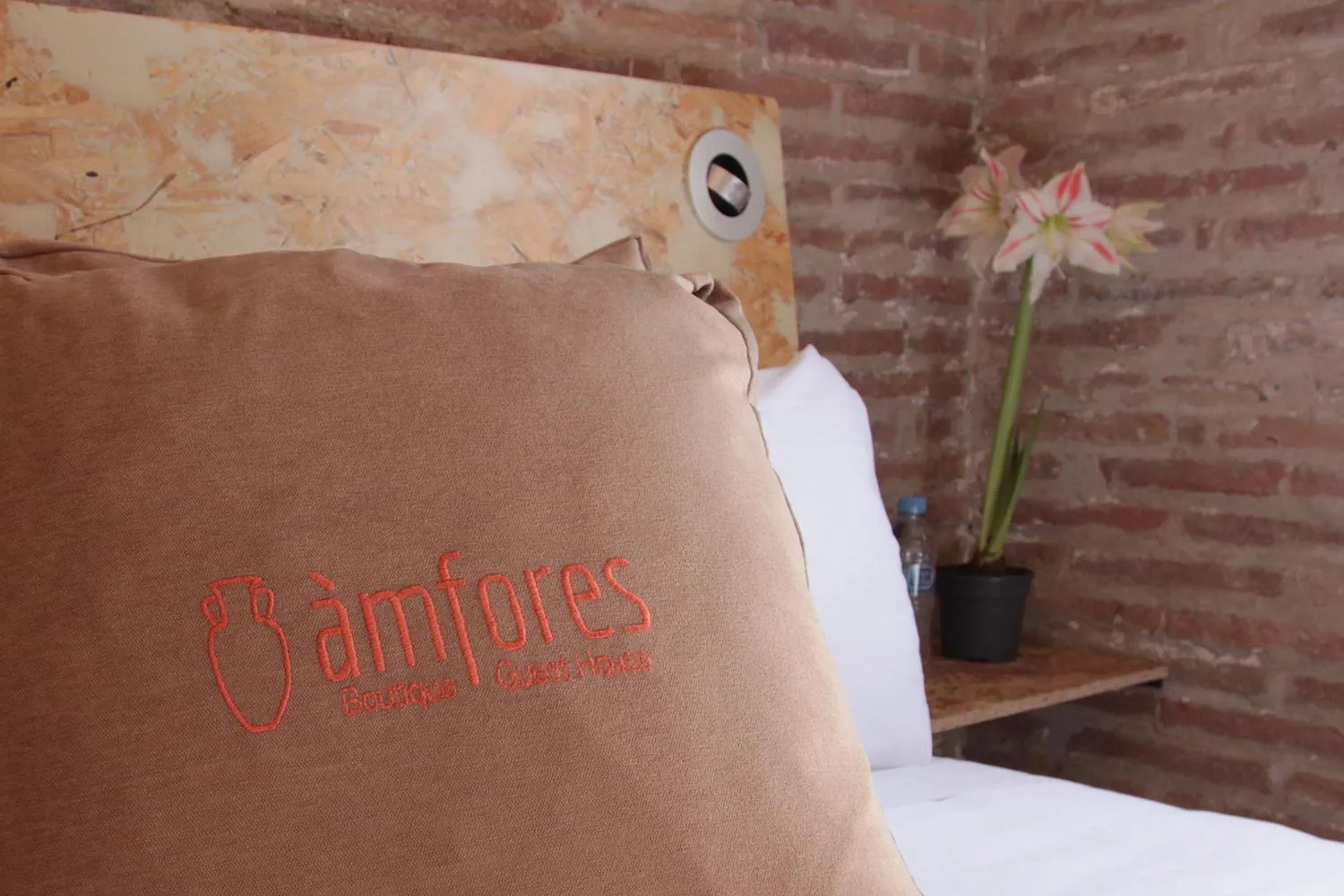 Decorative detail, Bed in Àmfores Boutique Guest House