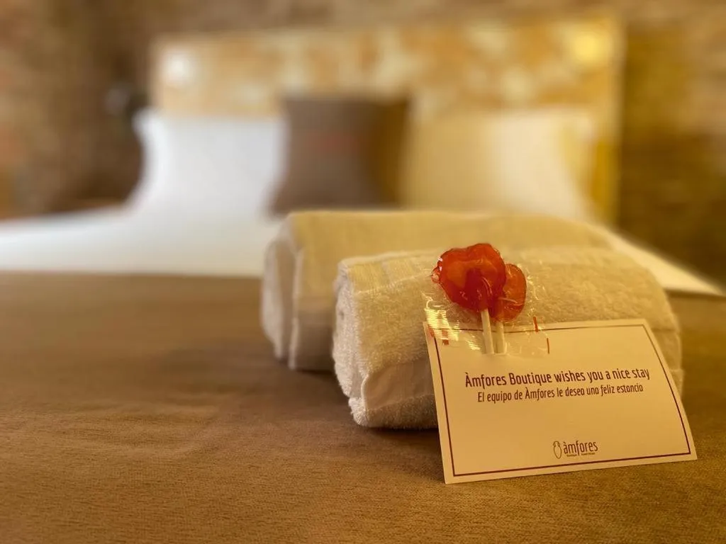 Bed in Àmfores Boutique Guest House