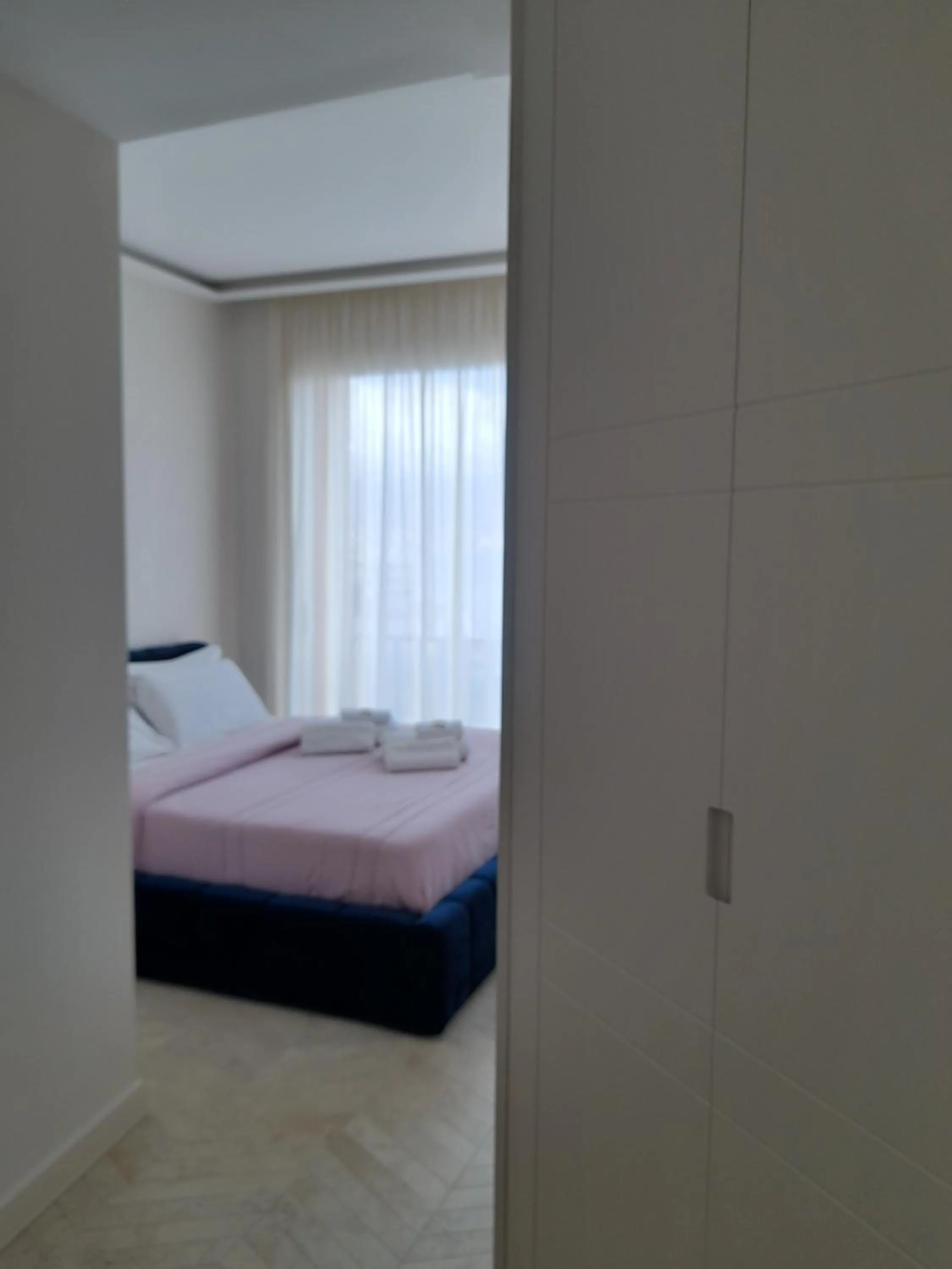 Bed in Tiffany & Babylon Luxury Stay