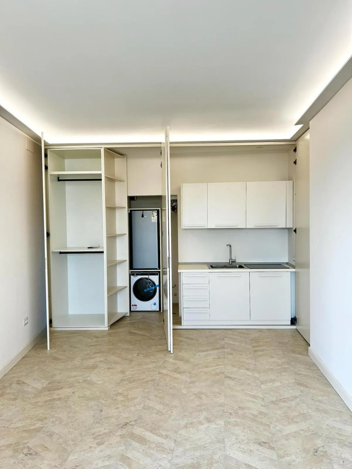 washing machine in Tiffany & Babylon Luxury Stay