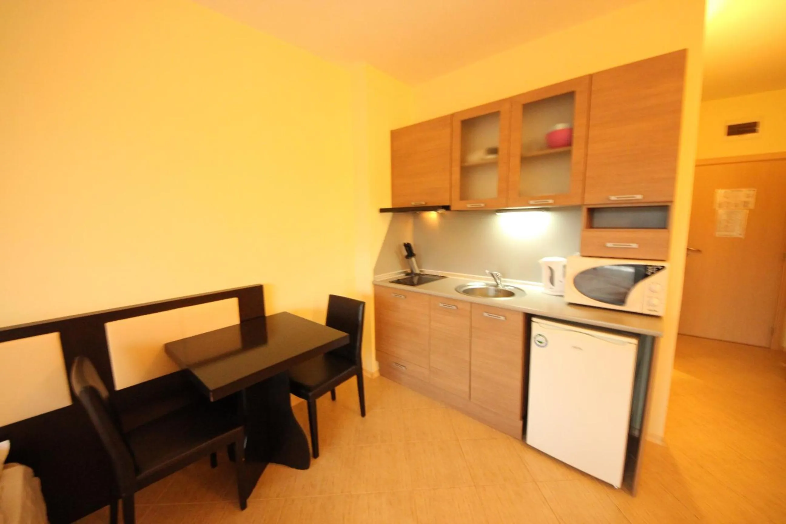 Kitchen or kitchenette in Menada Nestinarka Apartments