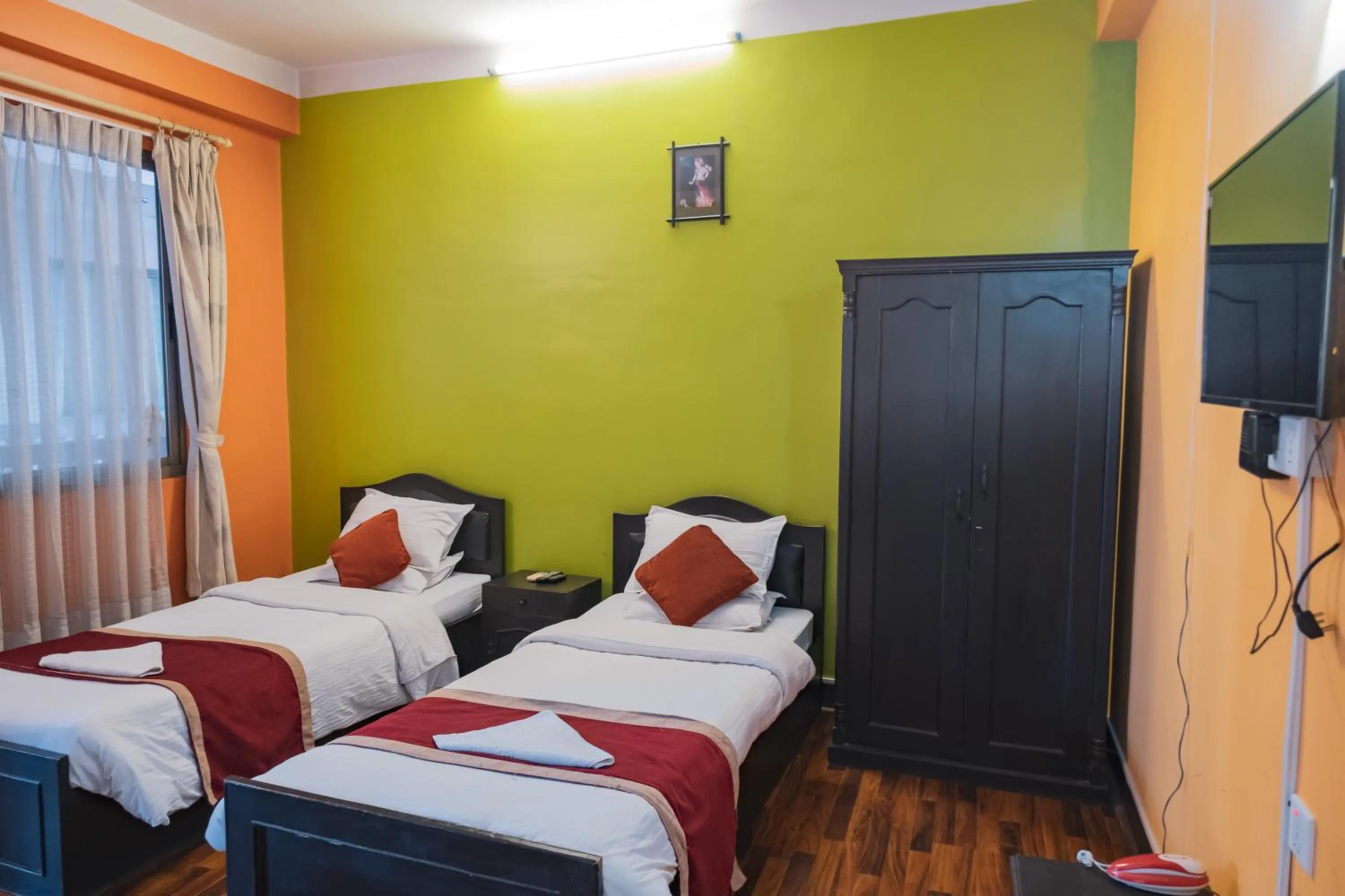 Bed in Hotel Nepalaya