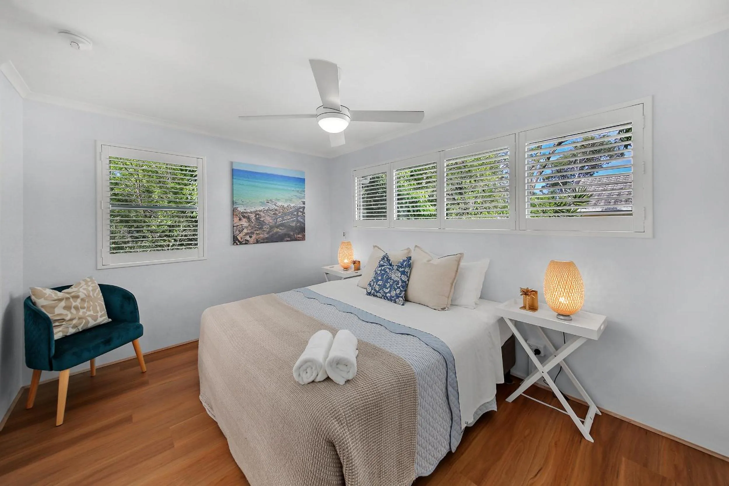 Bed in Chez Noosa Holiday Apartments