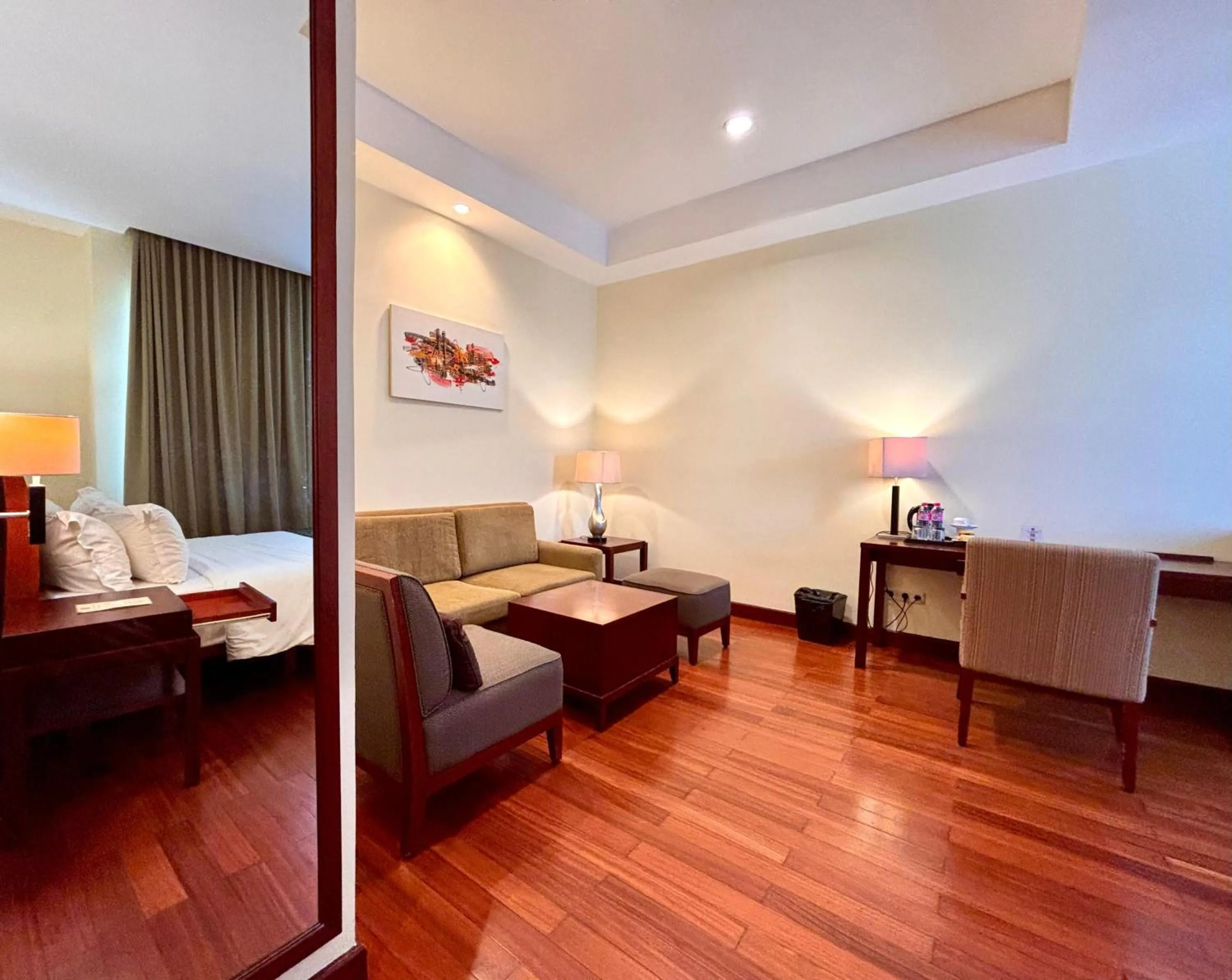 Living room, Bed in Manado Quality Hotel