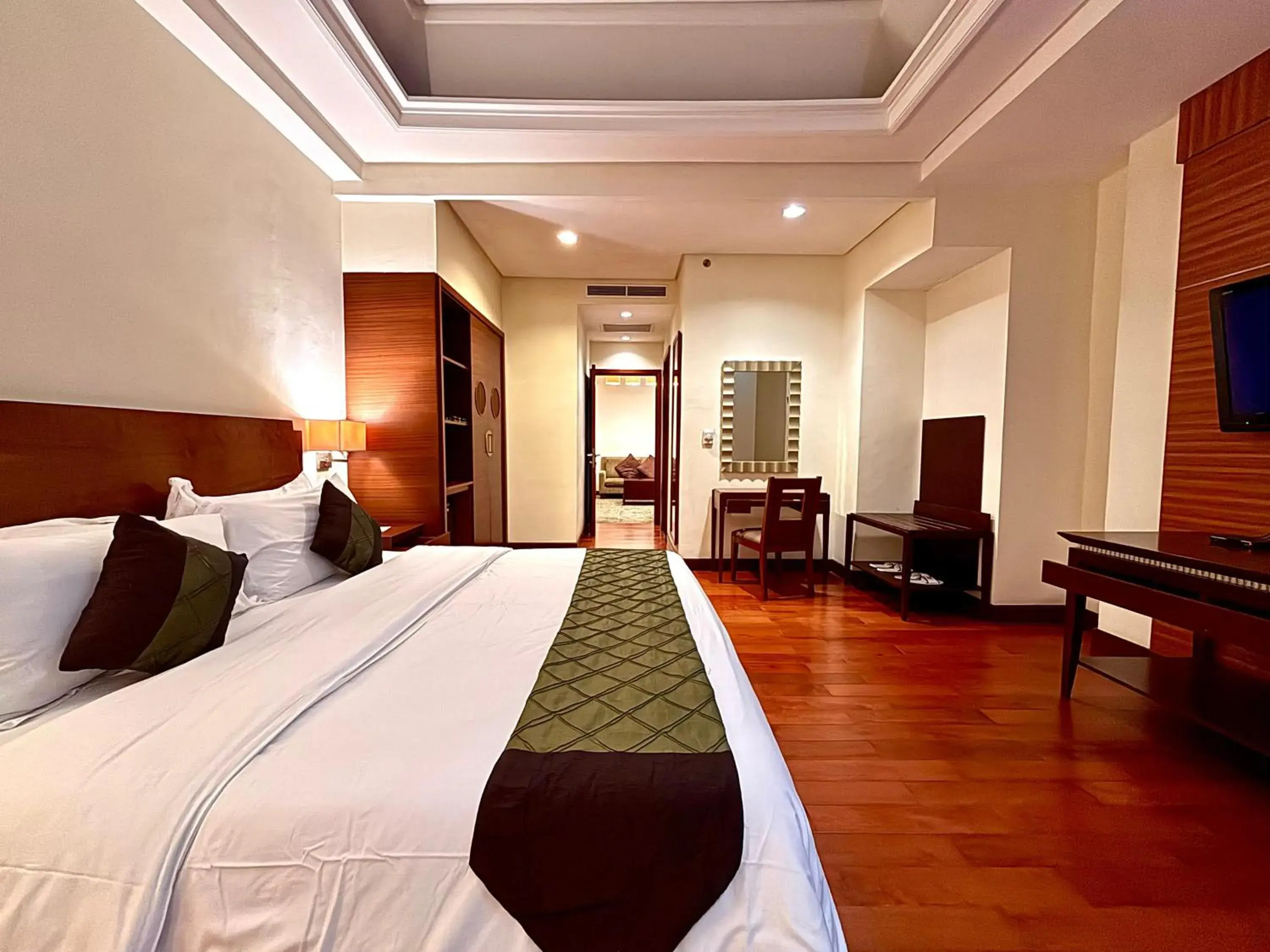 Living room, Bed in Manado Quality Hotel Living room, Bed in Manado Quality Hotel