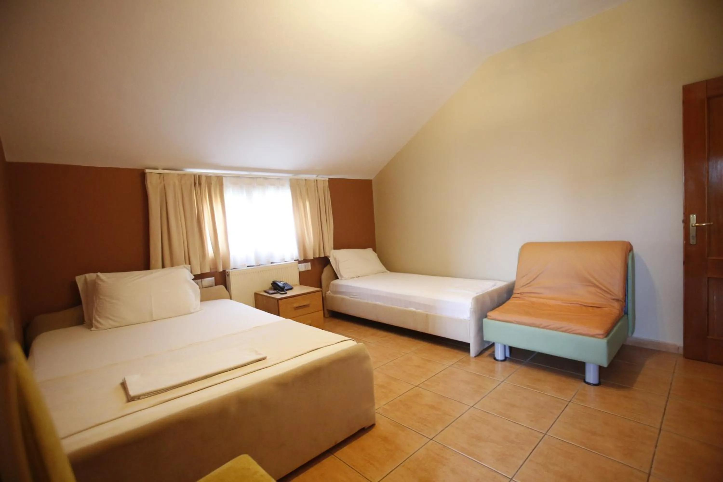 Photo of the whole room, Bed in Hotel Akropoli