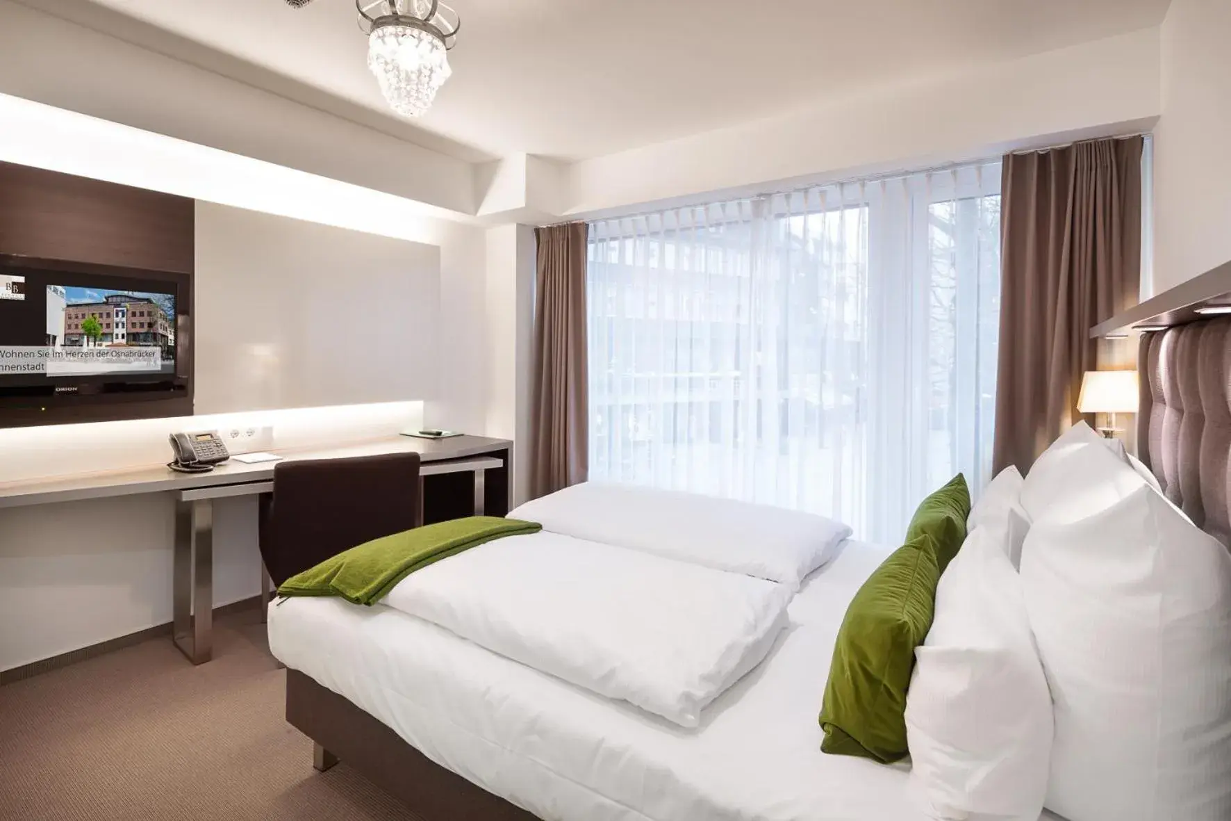 Photo of the whole room, Bed in Bergmann Boardinghouse Osnabrück Photo of the whole room, Bed in Bergmann Boardinghouse Osnabrück