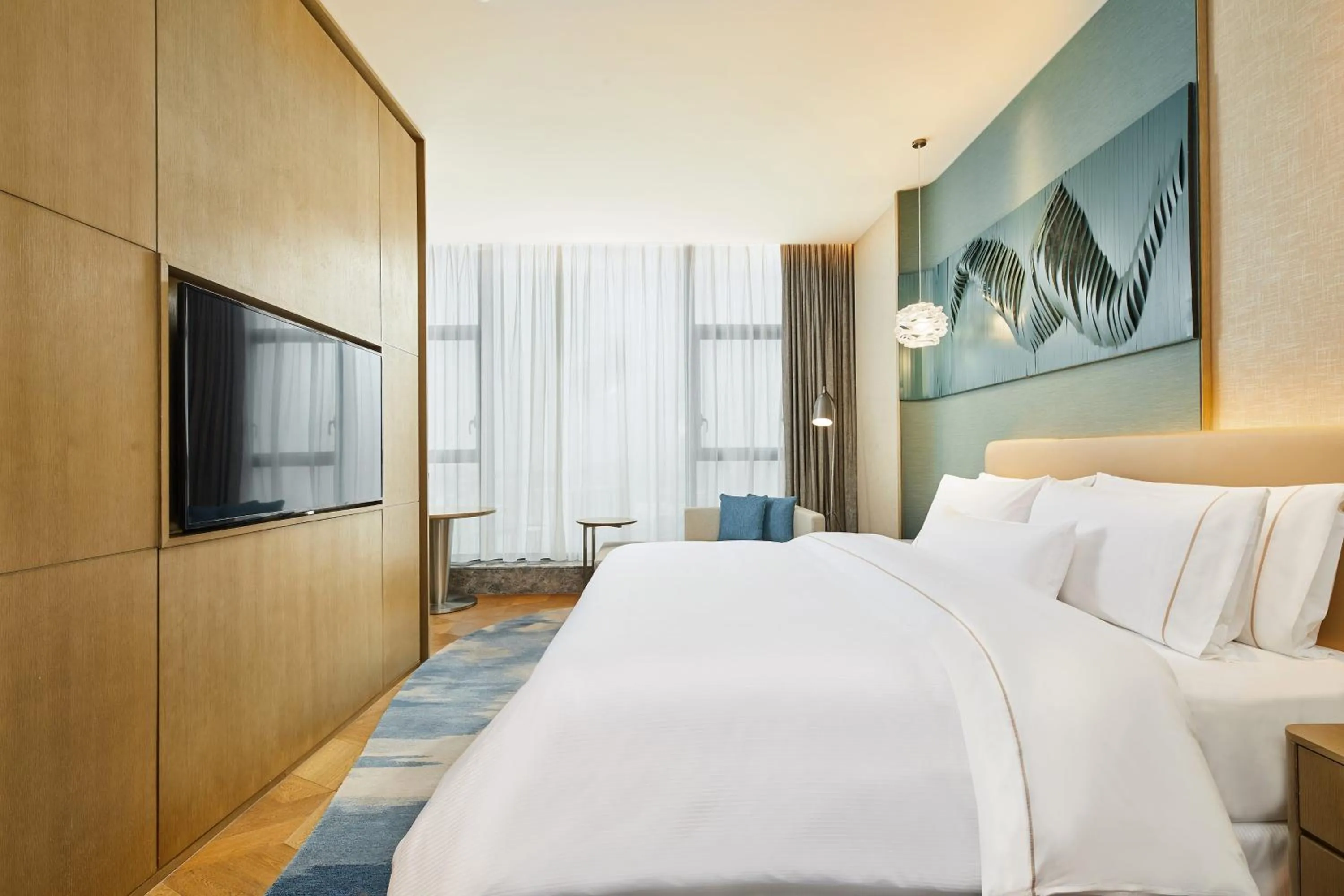 Photo of the whole room, Bed in The Westin Qingdao West Coast