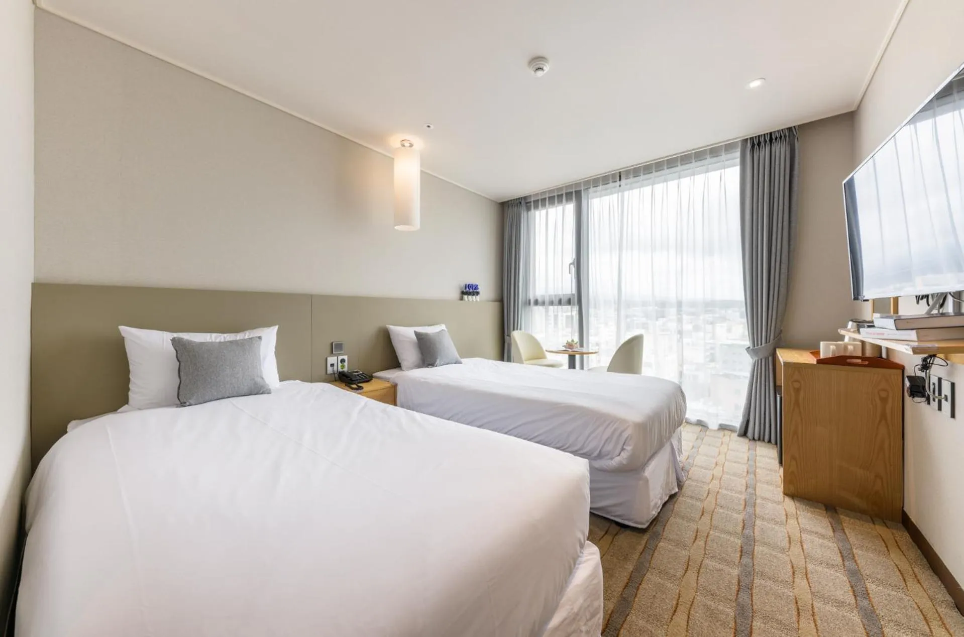 Bed in Shin Shin Hotel Cheonjiyeon