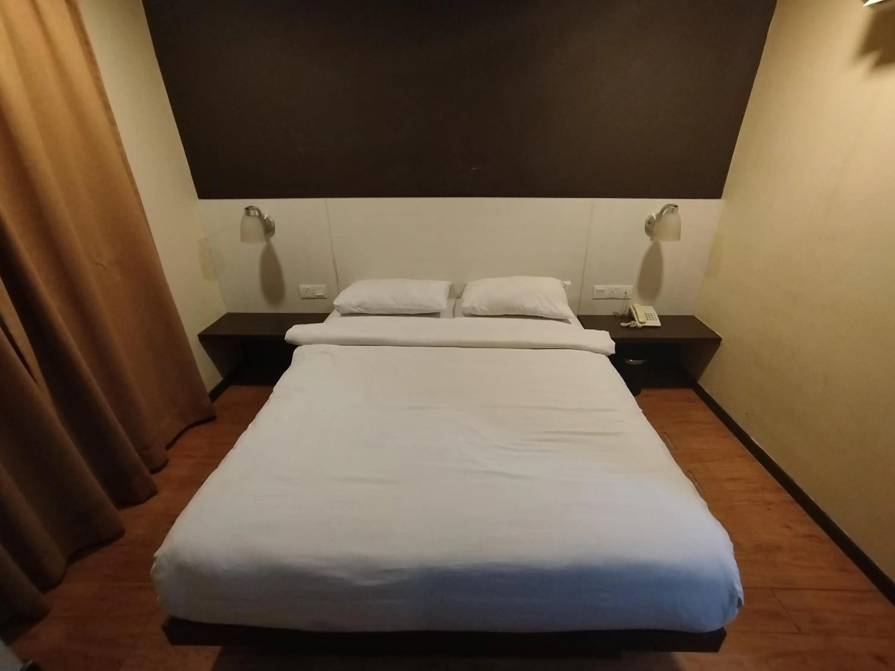 Bed in Hotel De Grand Orchard