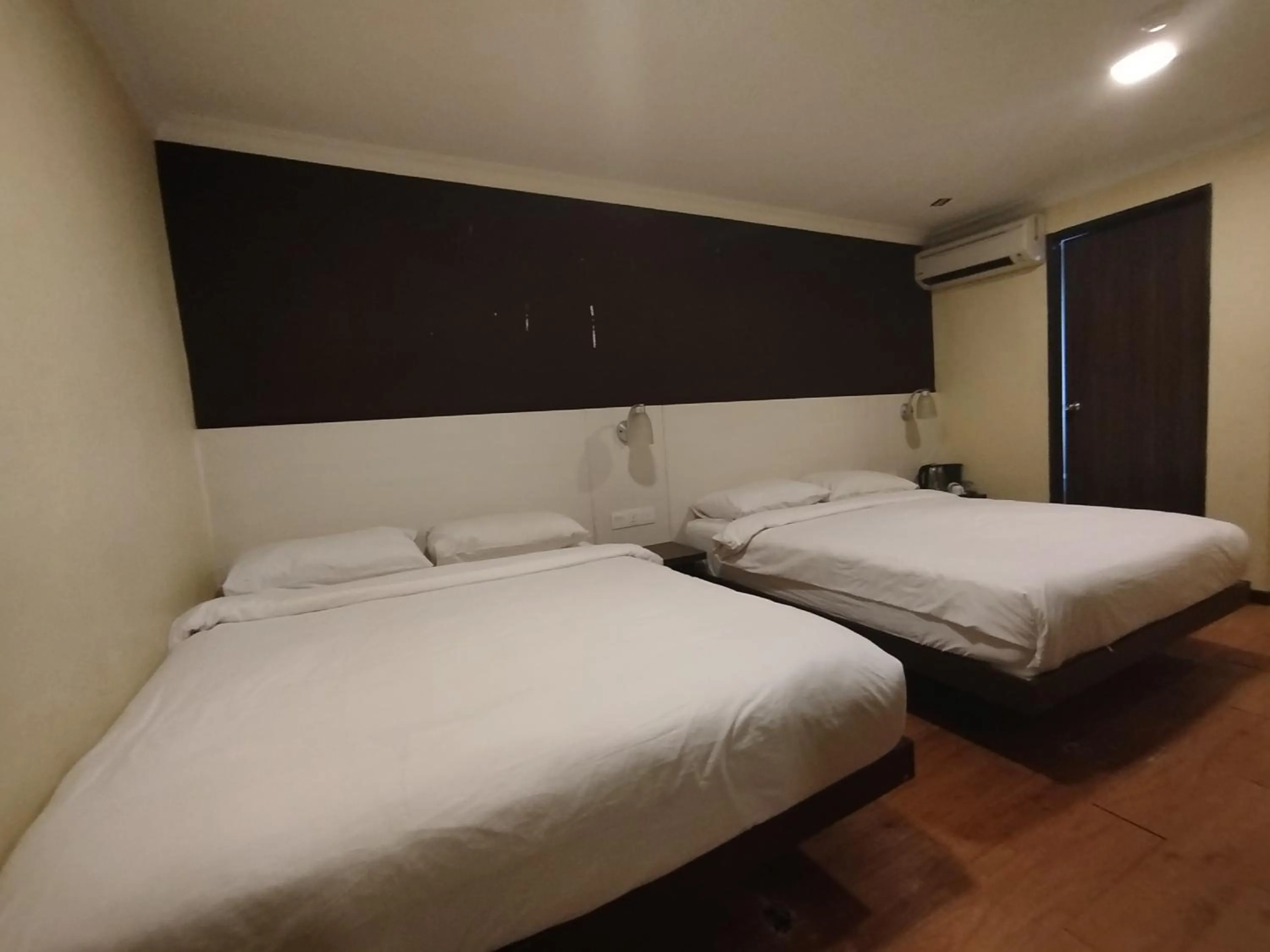 Bed in Hotel De Grand Orchard