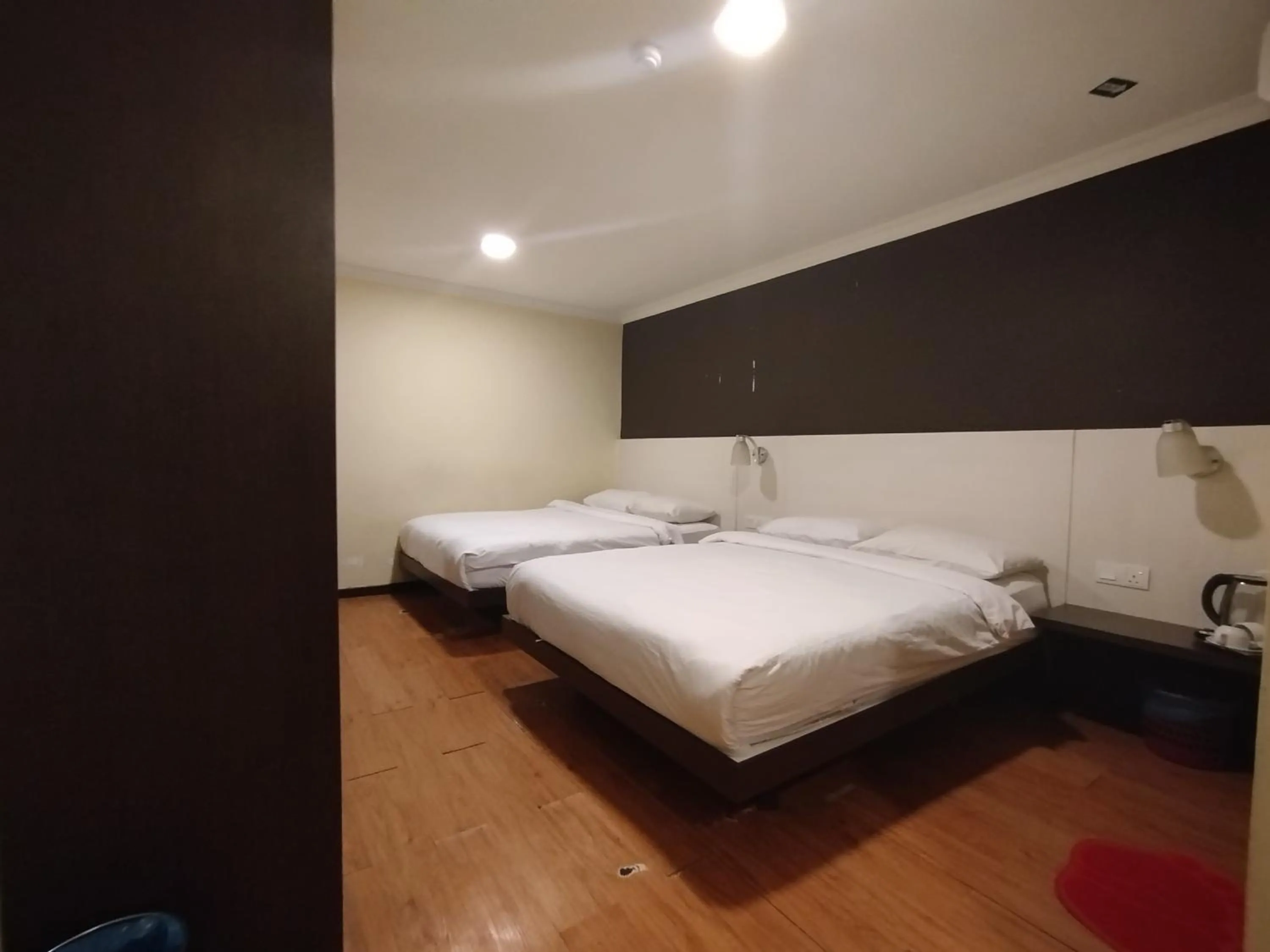 Bed in Hotel De Grand Orchard