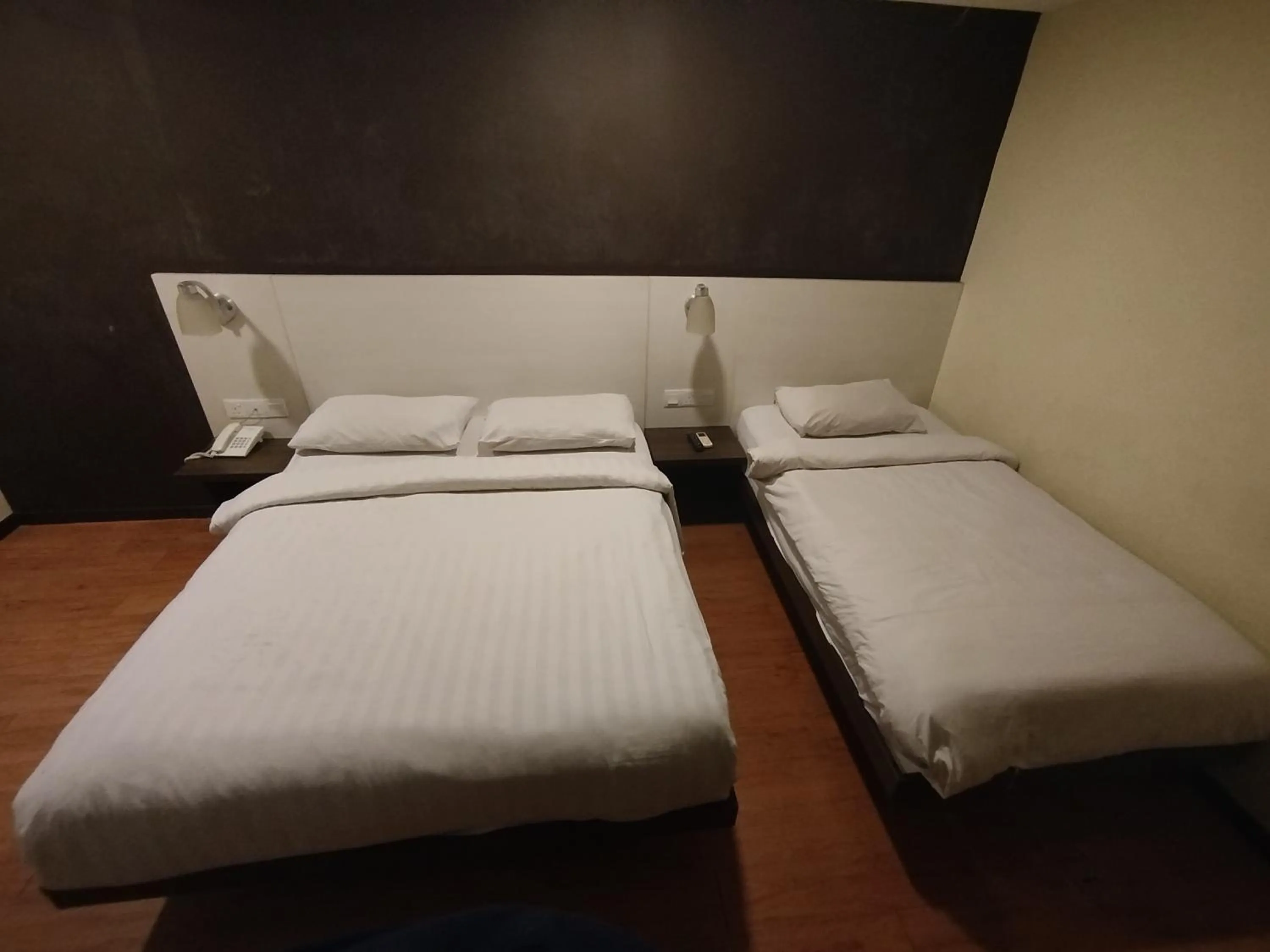 Bed in Hotel De Grand Orchard