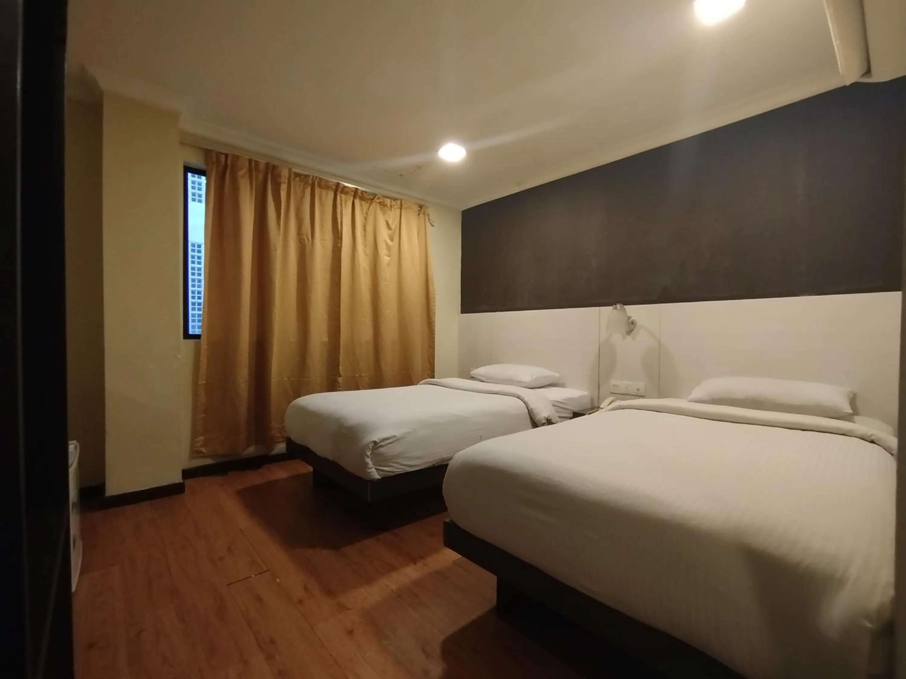 Bed in Hotel De Grand Orchard