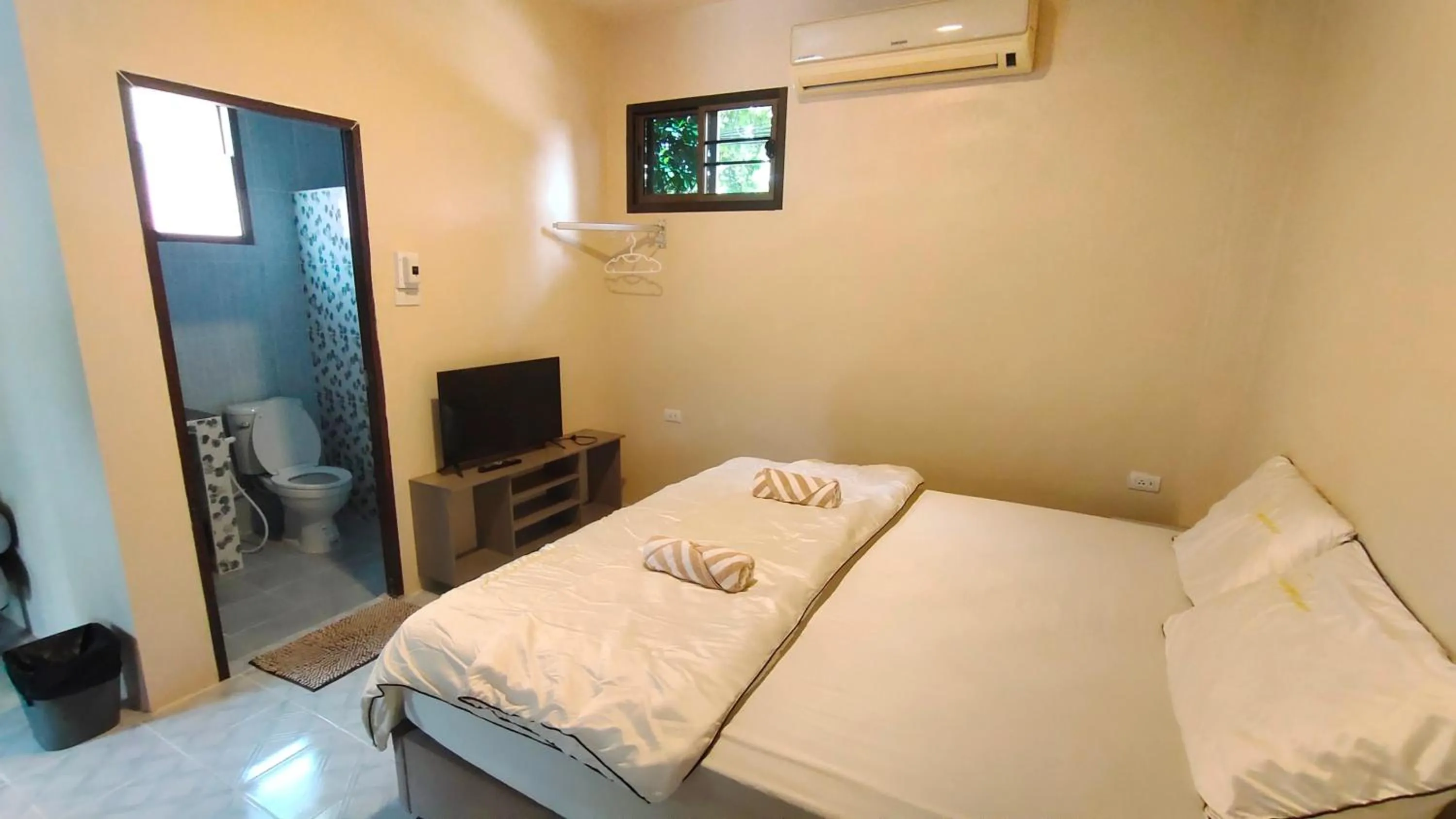 Bed in Moon River Resort Phimai