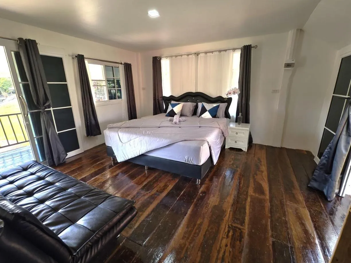 Bed in Moon River Resort Phimai