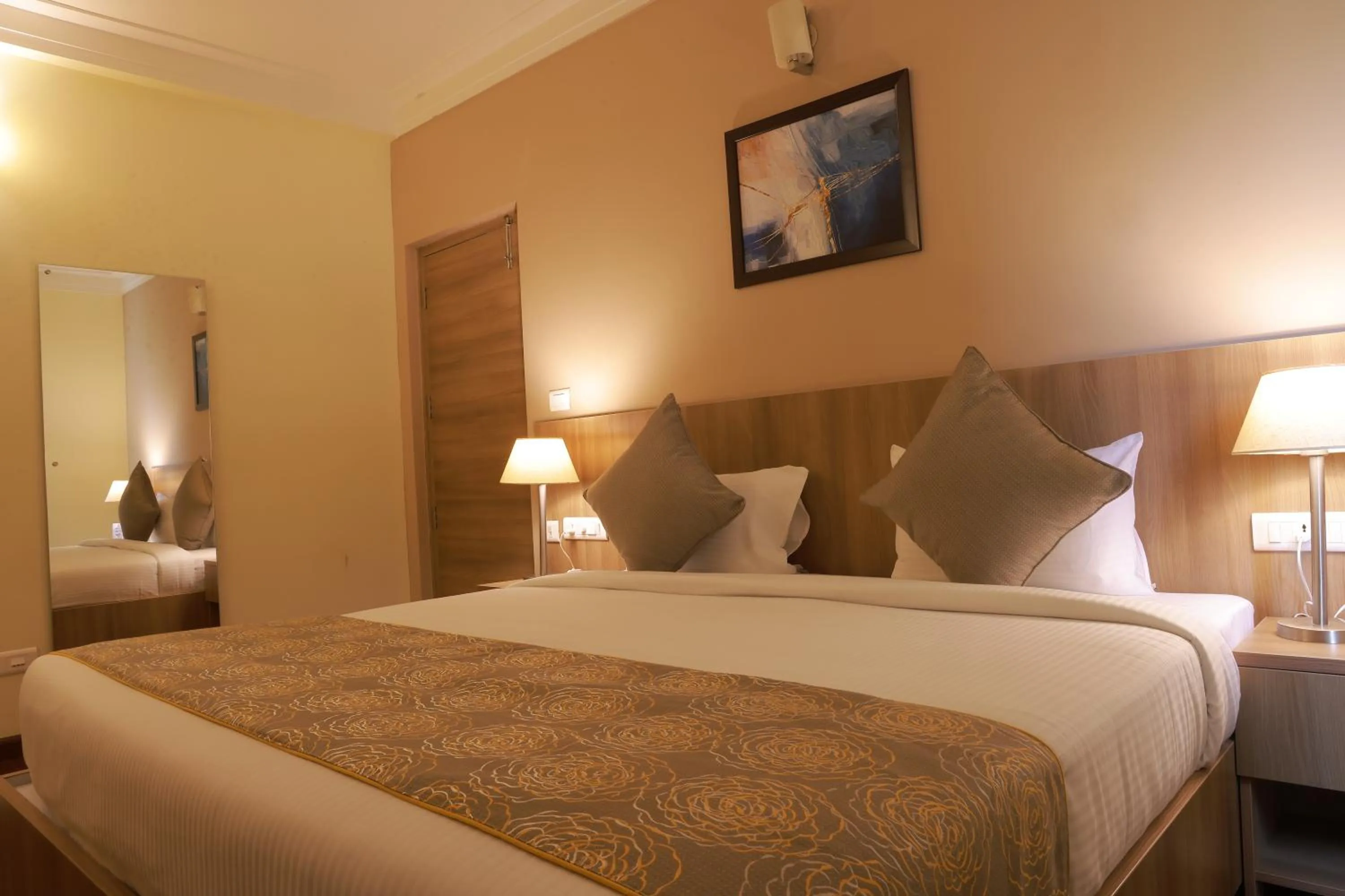 Photo of the whole room, Bed in Starlit Suites Tirupati