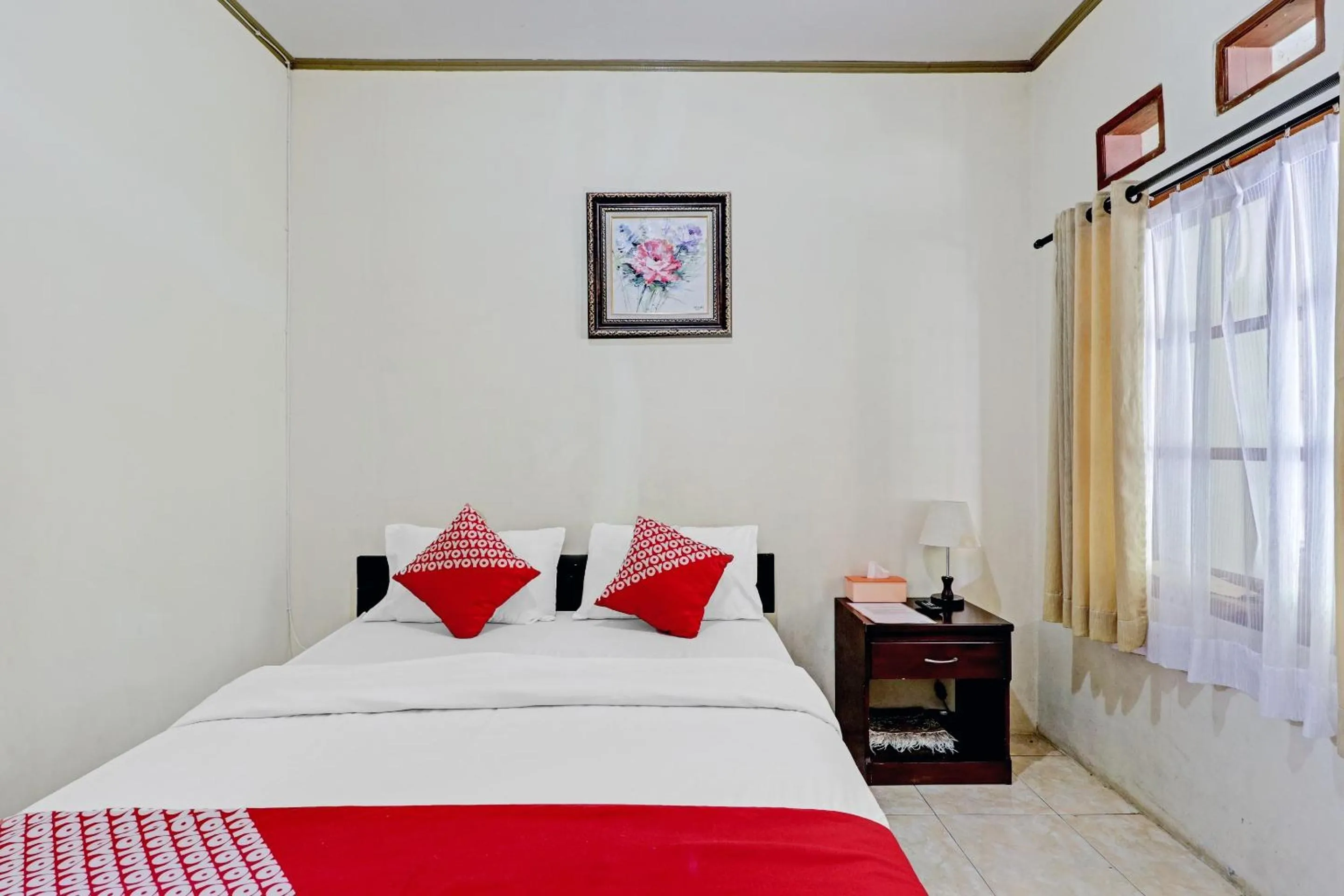 Bedroom in Collection O 90461 Graha Atmadja Syariah Guest House