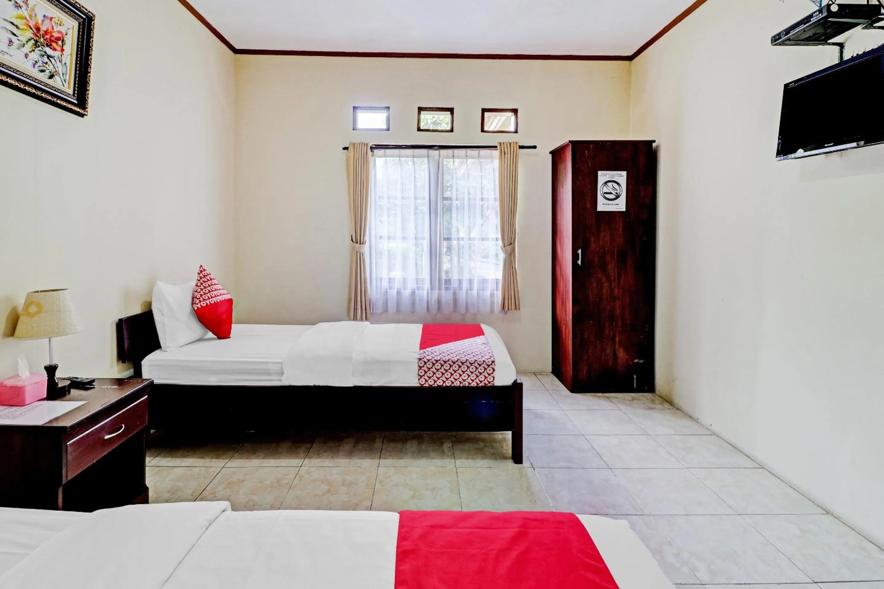 Bedroom in Collection O 90461 Graha Atmadja Syariah Guest House