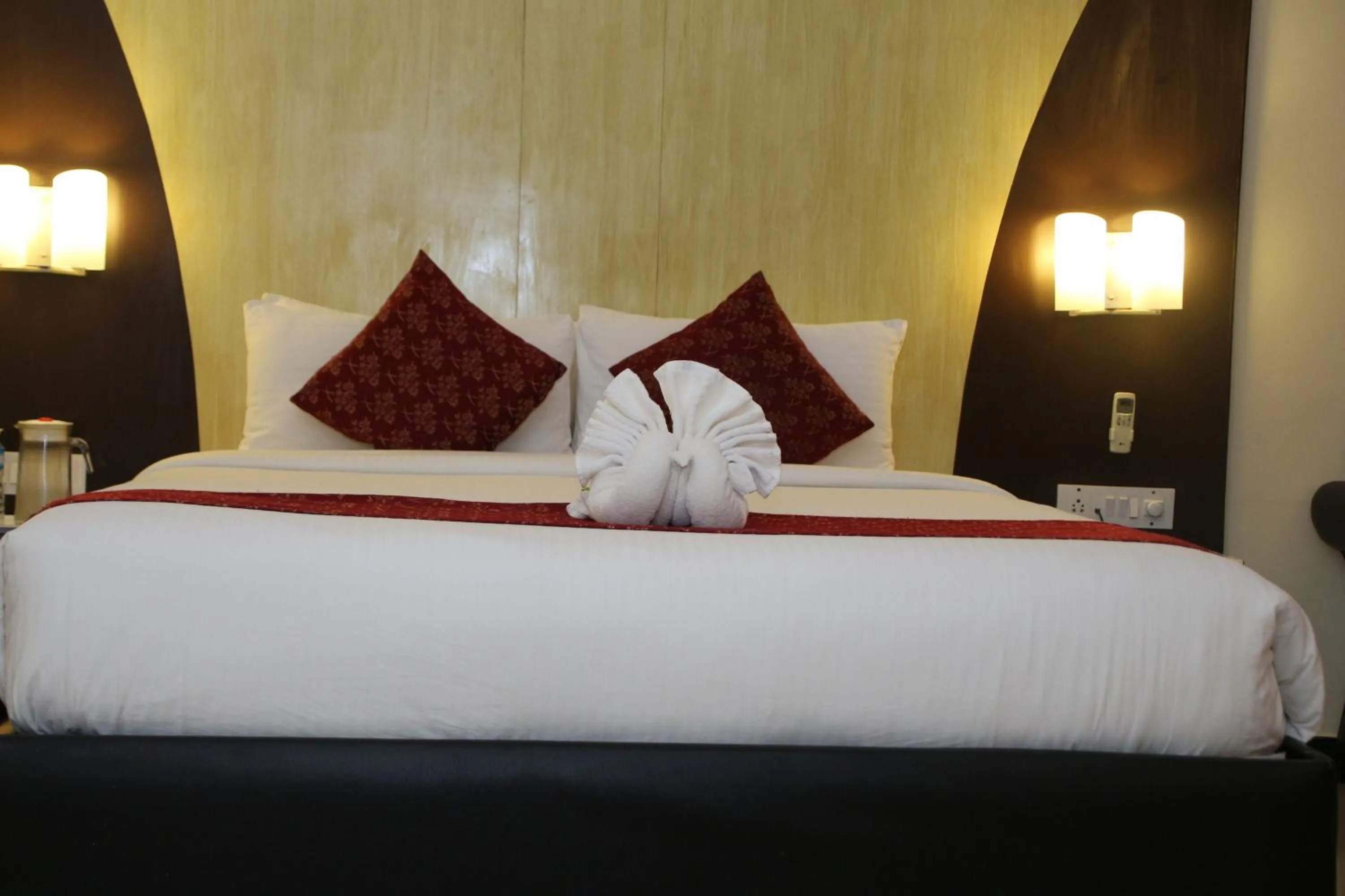 Bed in Ramanashree California Resort