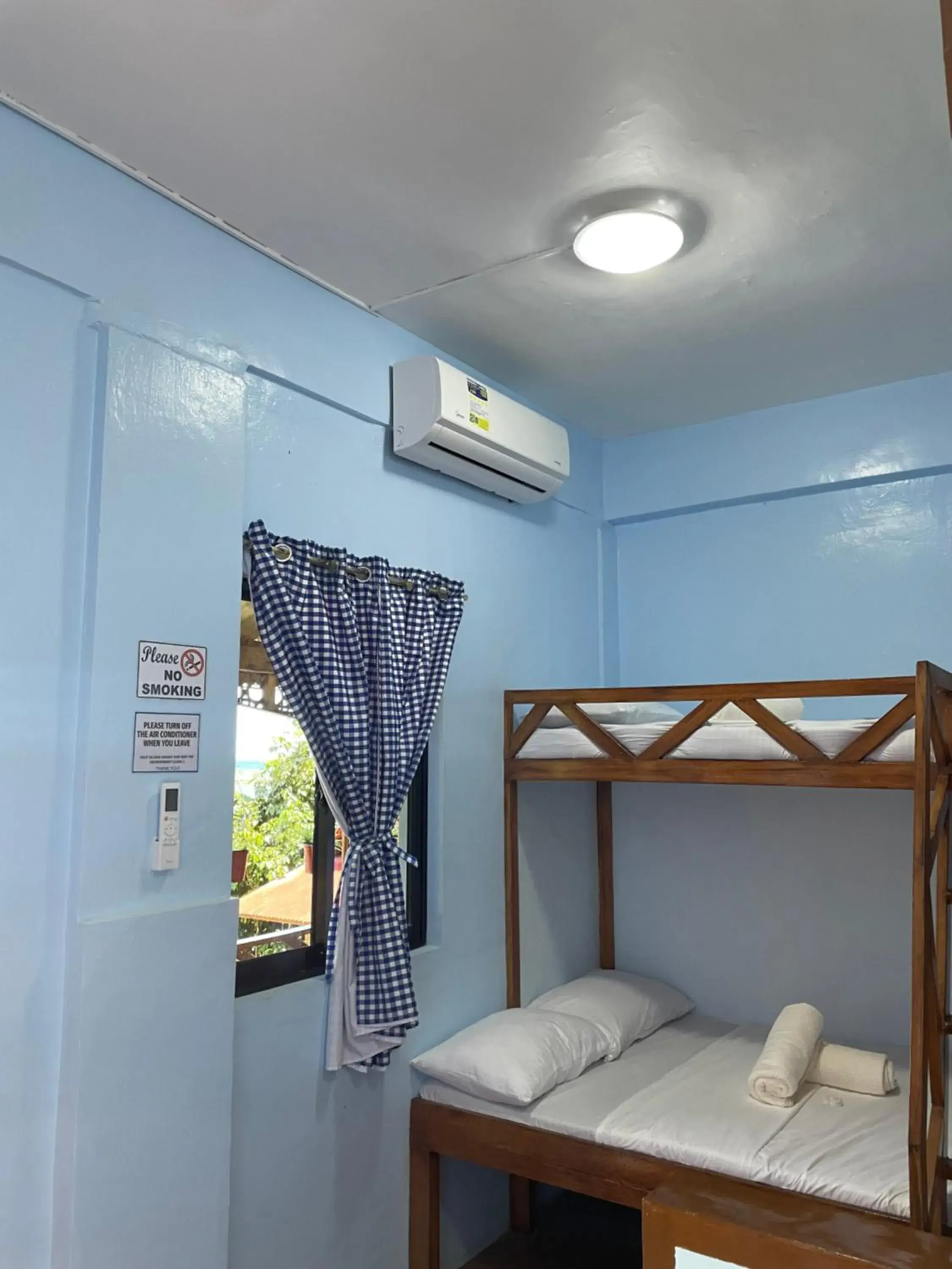 Bed in Camiguin Blue Lagoon Cottages Bed in Camiguin Blue Lagoon Cottages