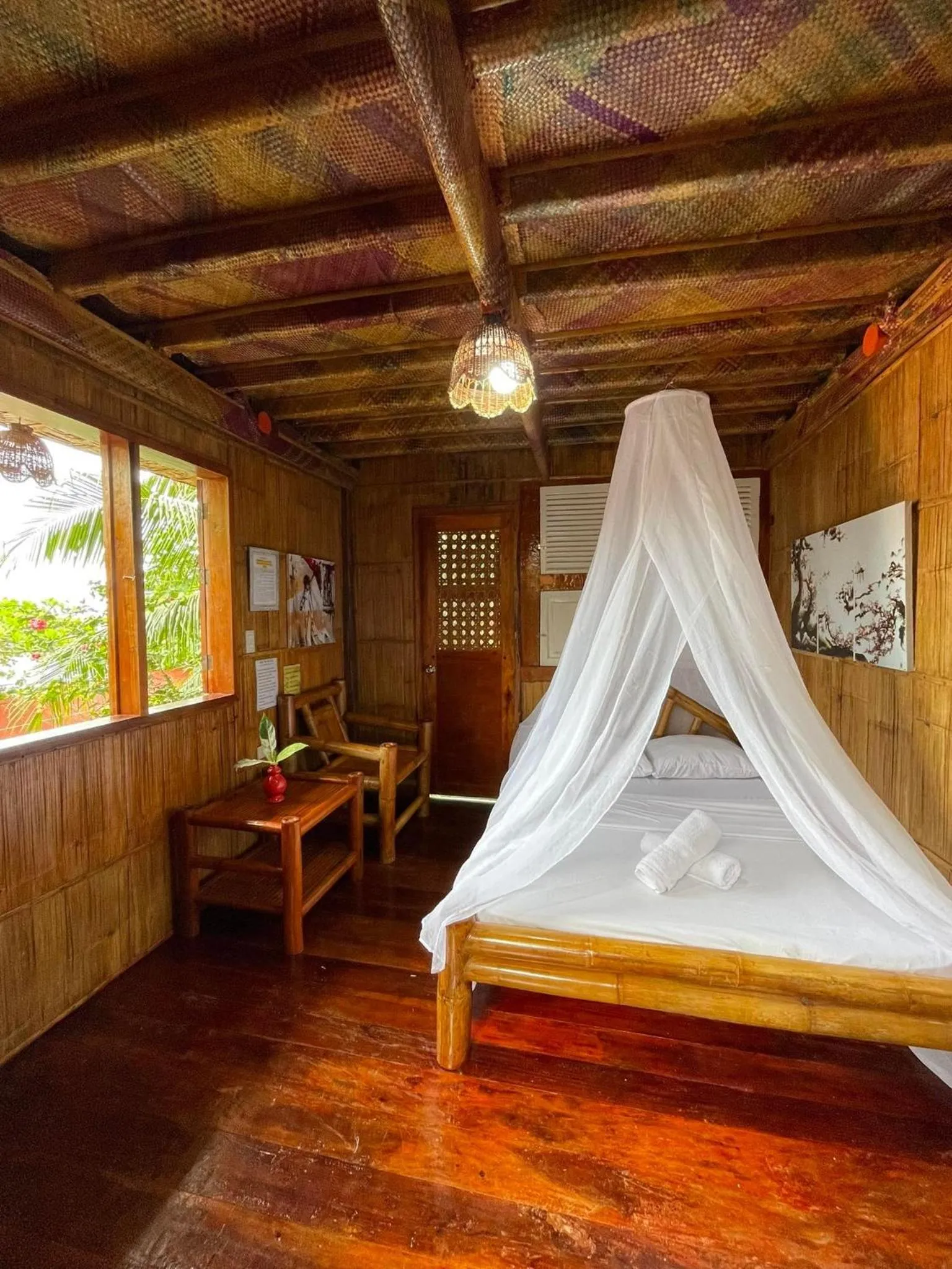 Bed in Camiguin Blue Lagoon Cottages