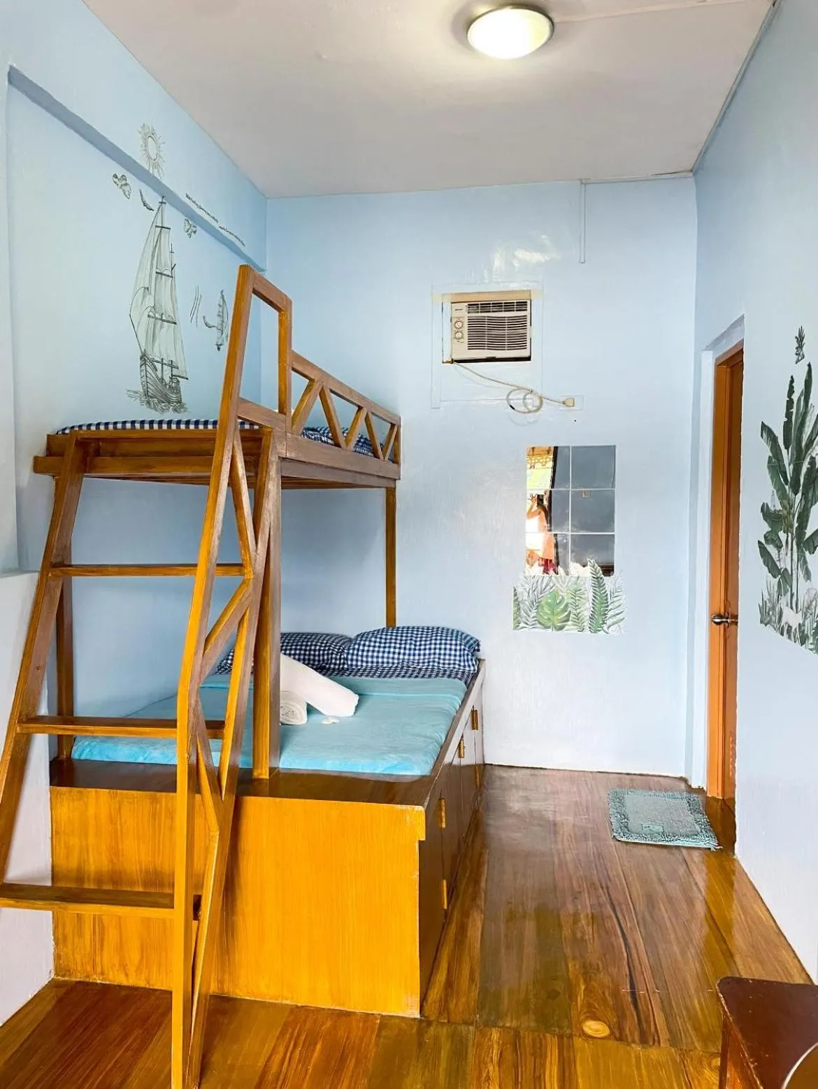 Bed in Camiguin Blue Lagoon Cottages