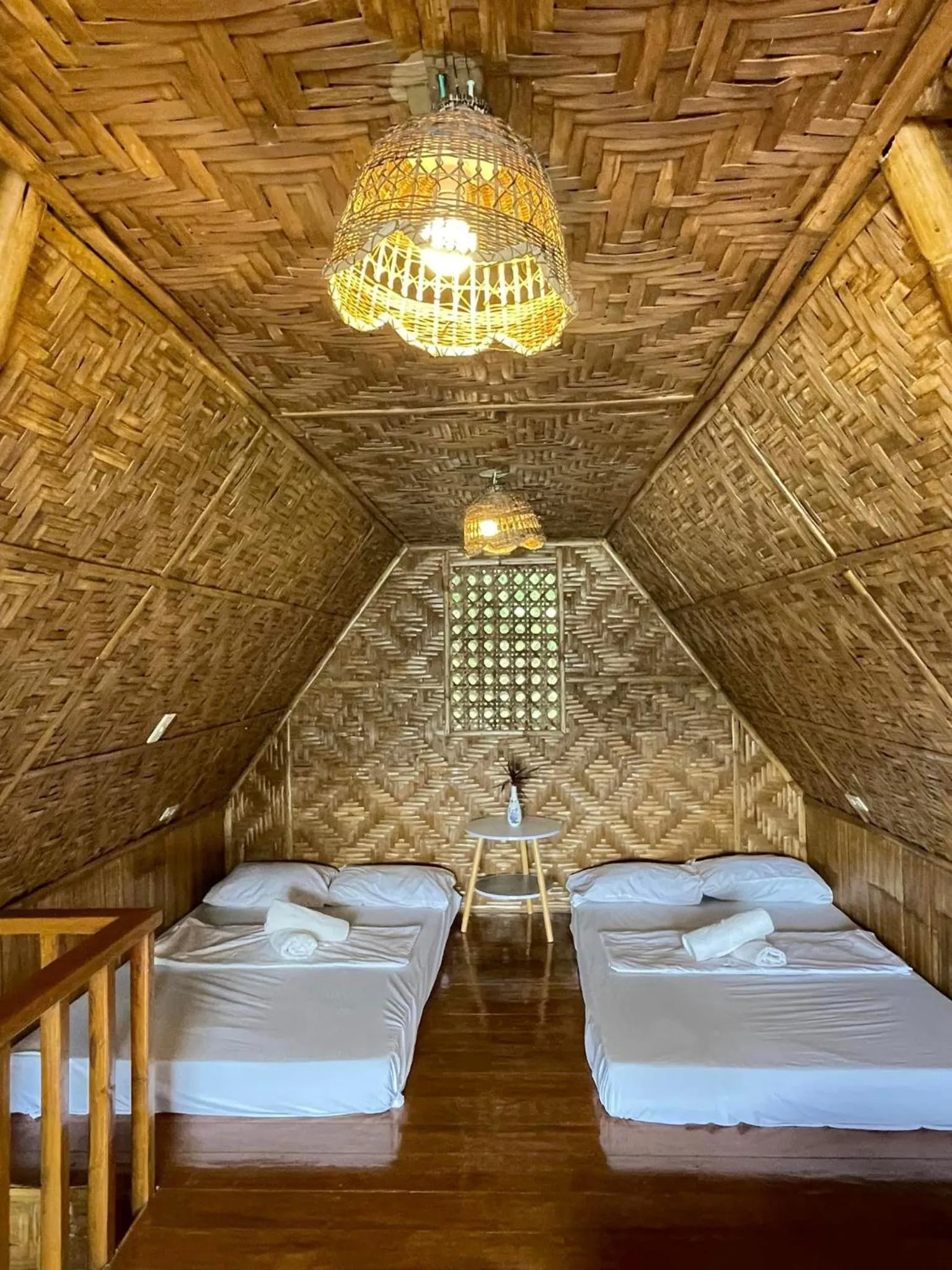 Bed in Camiguin Blue Lagoon Cottages