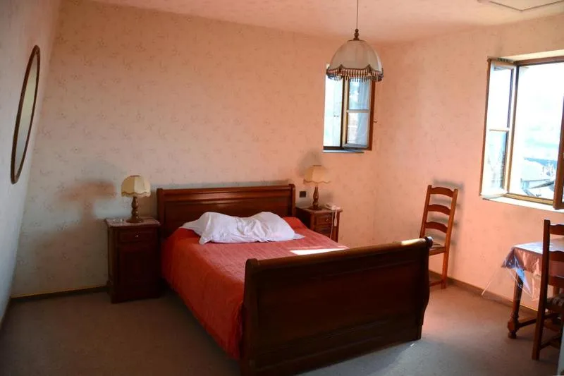 Bed in Auberge de la Poste