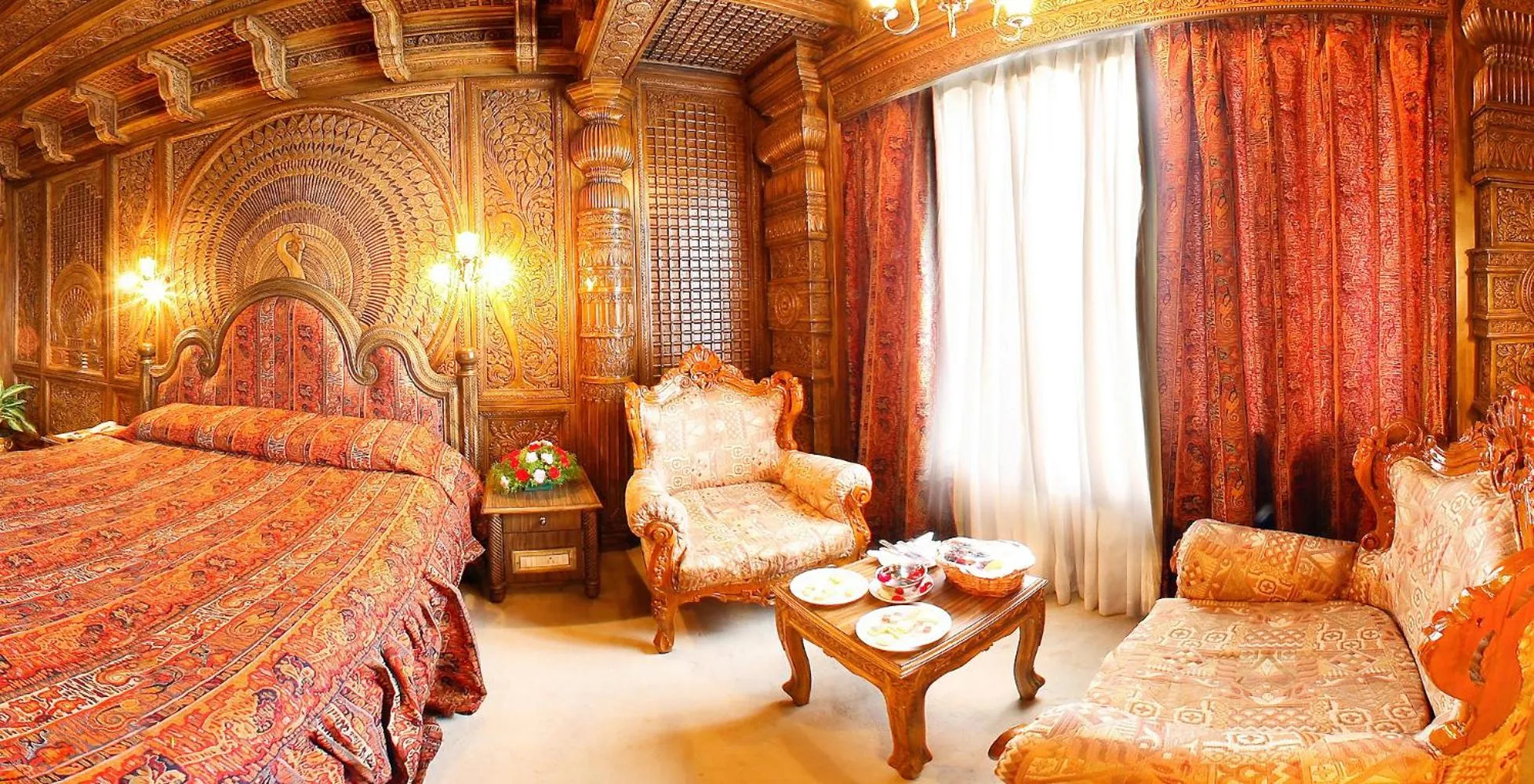 Seating area, Bed in Ramoji Film City- Sitara Luxury Hotel