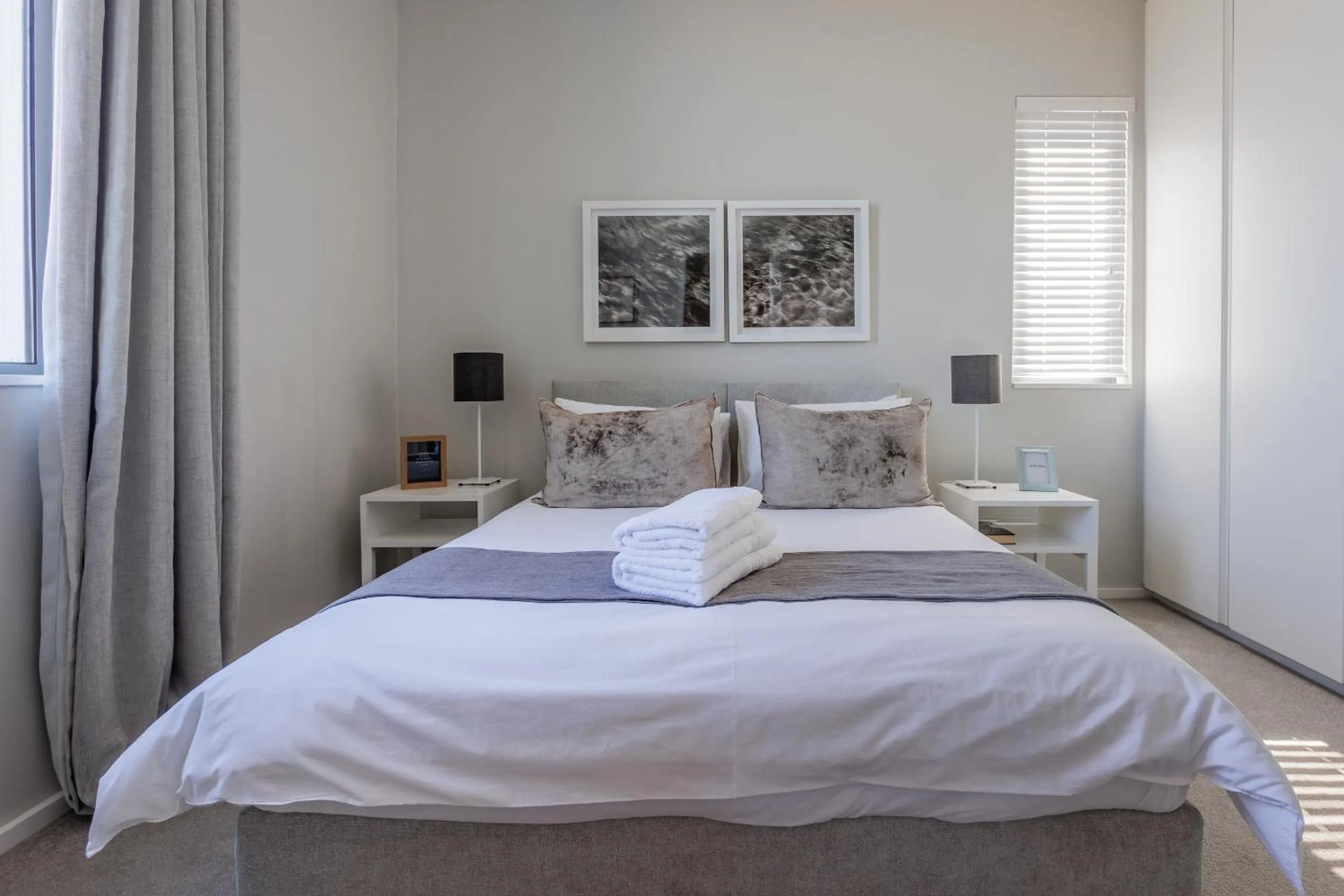 Bed in Axis Luxury Apartments by Century City Hotels