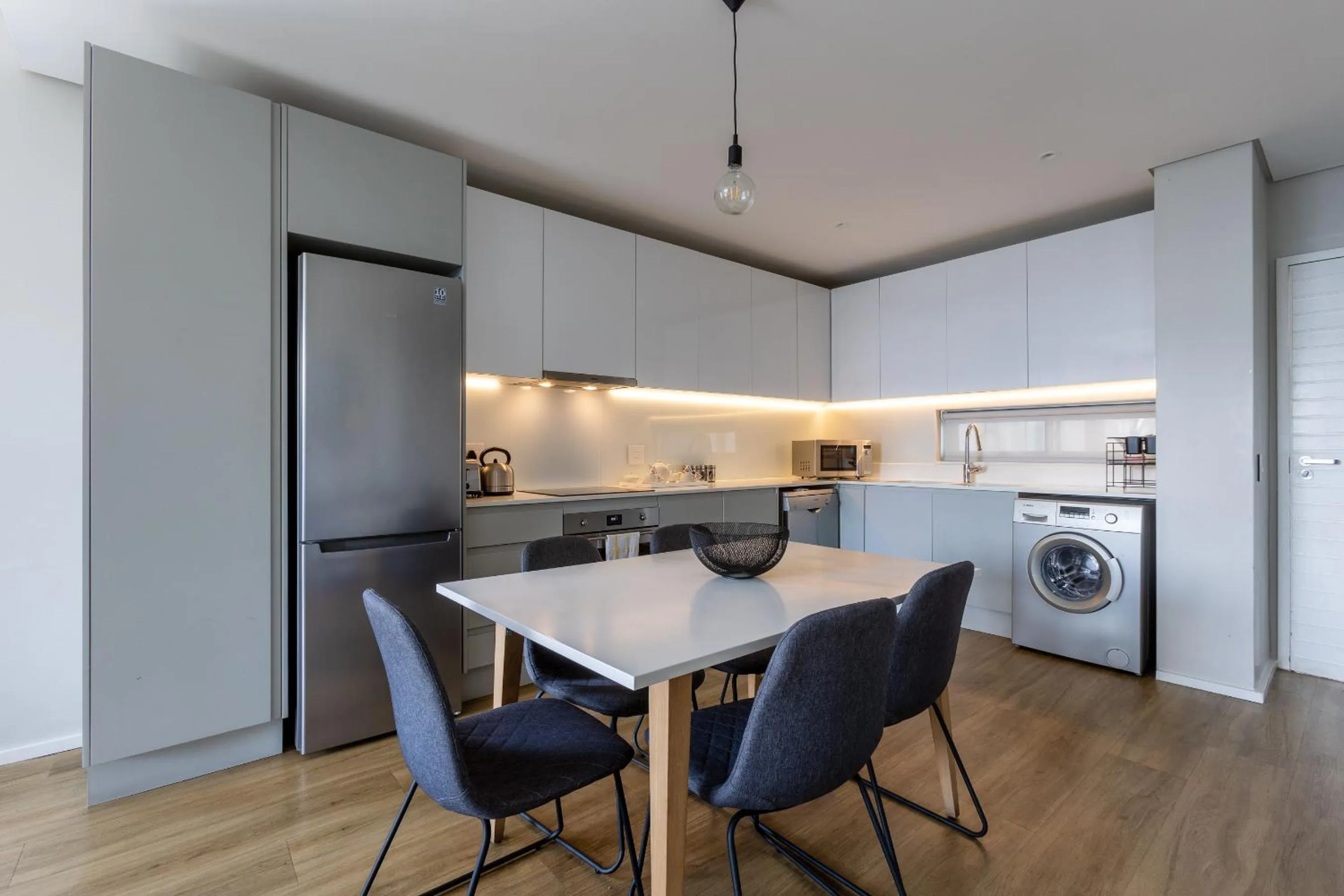 Kitchen or kitchenette in Axis Luxury Apartments by Century City Hotels