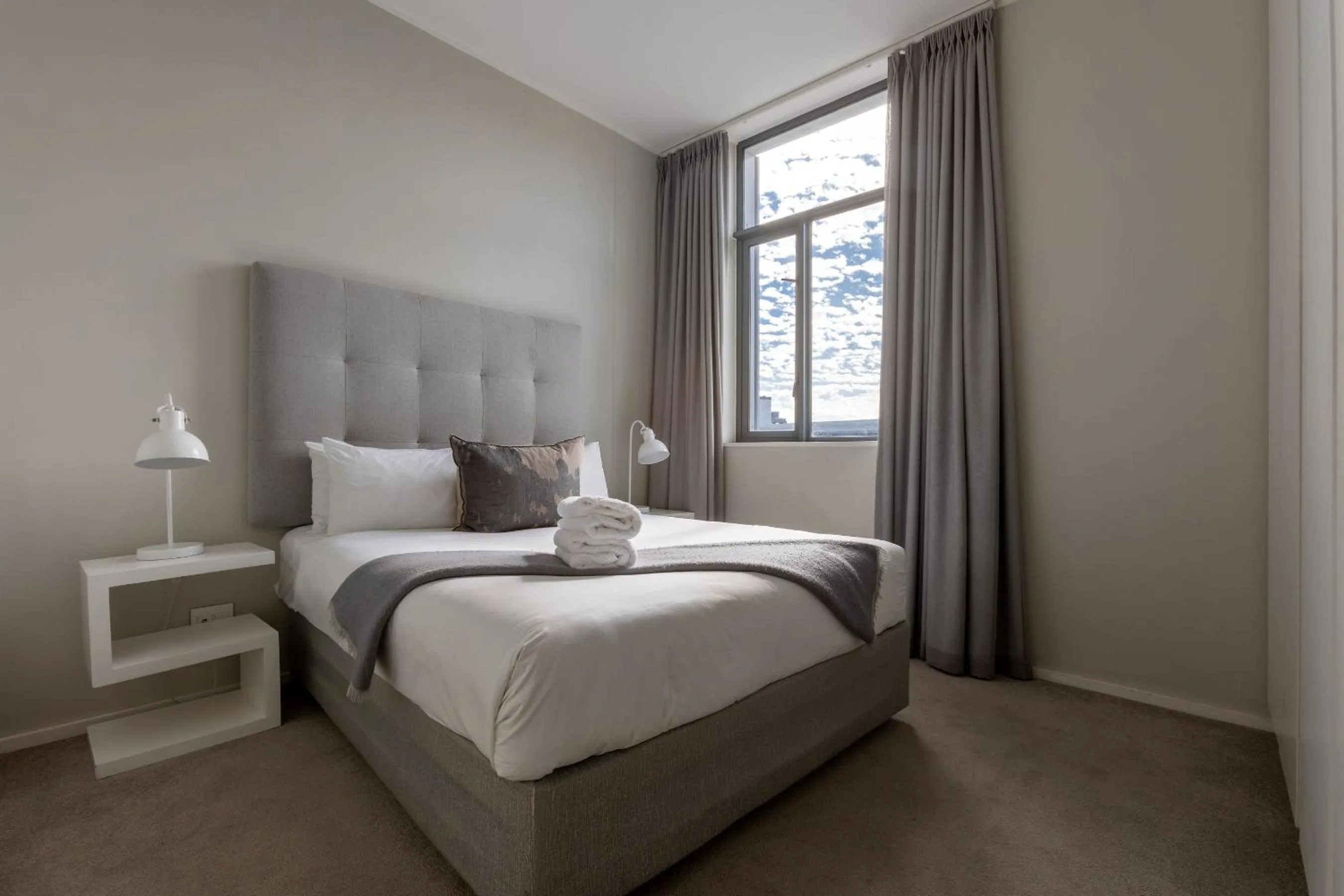 Bed in Axis Luxury Apartments by Century City Hotels