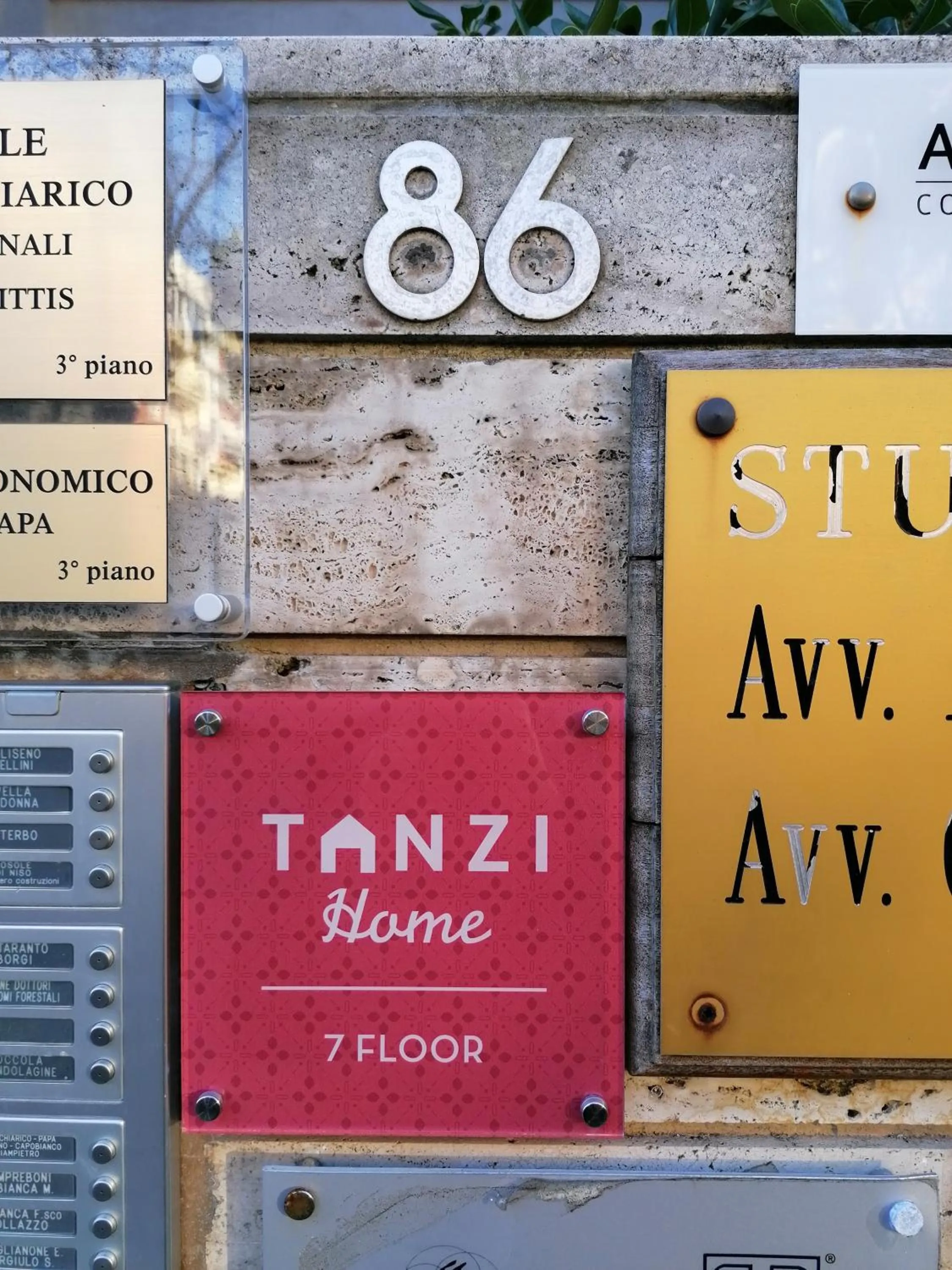 Property logo or sign in Tanzi Home