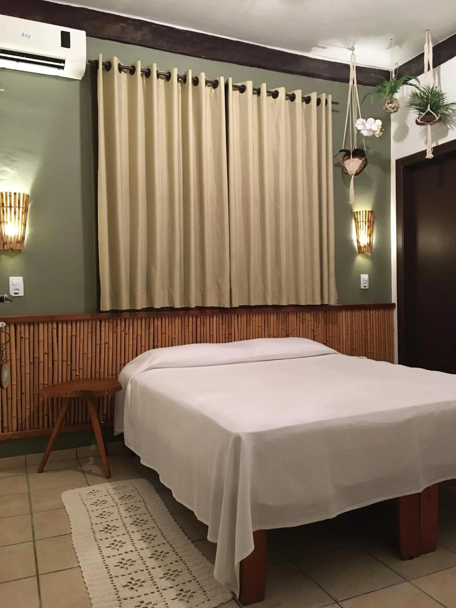 Bed in Pousada Aroeira