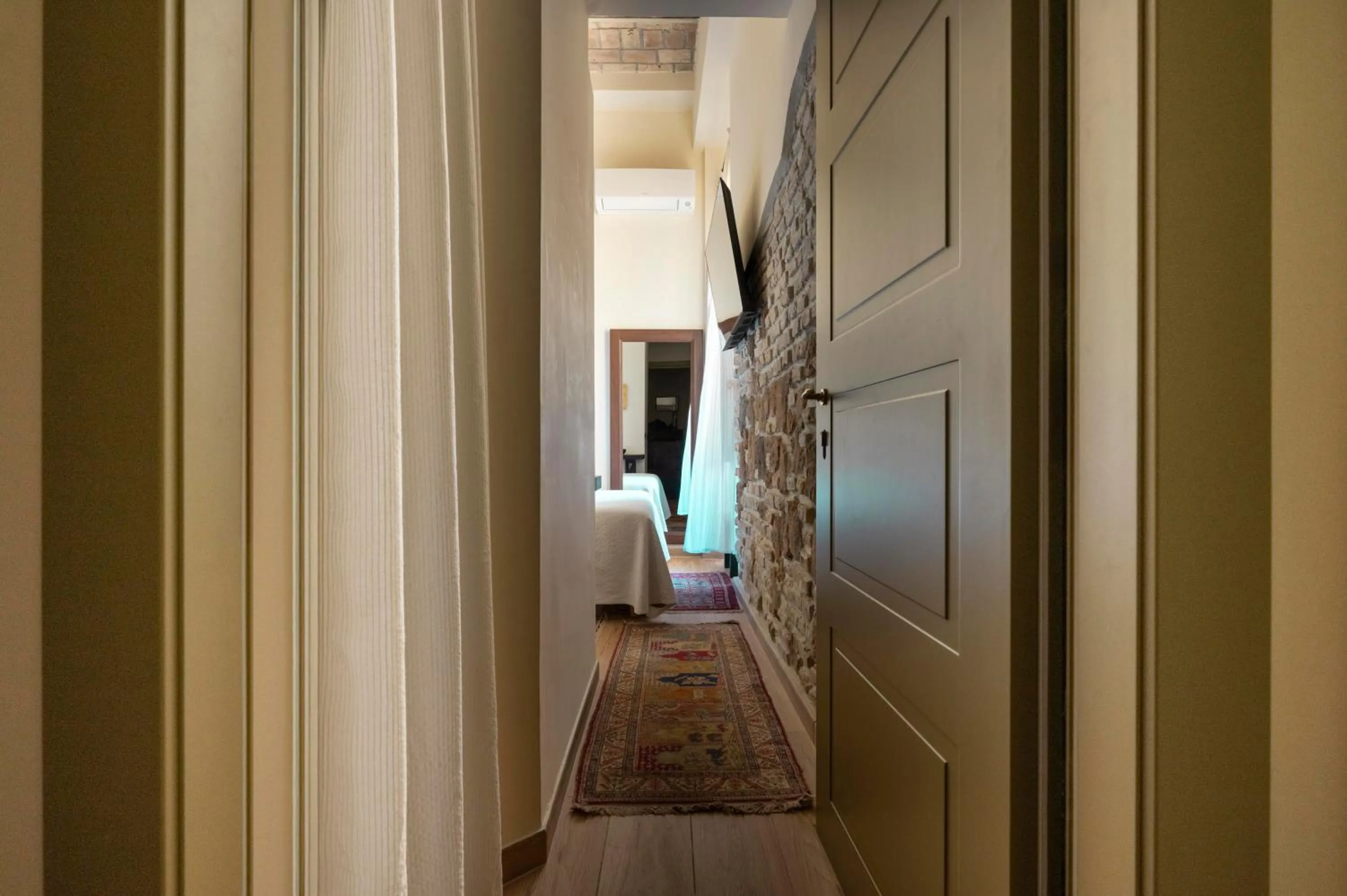 Bedroom in Palm Gallery Hotel