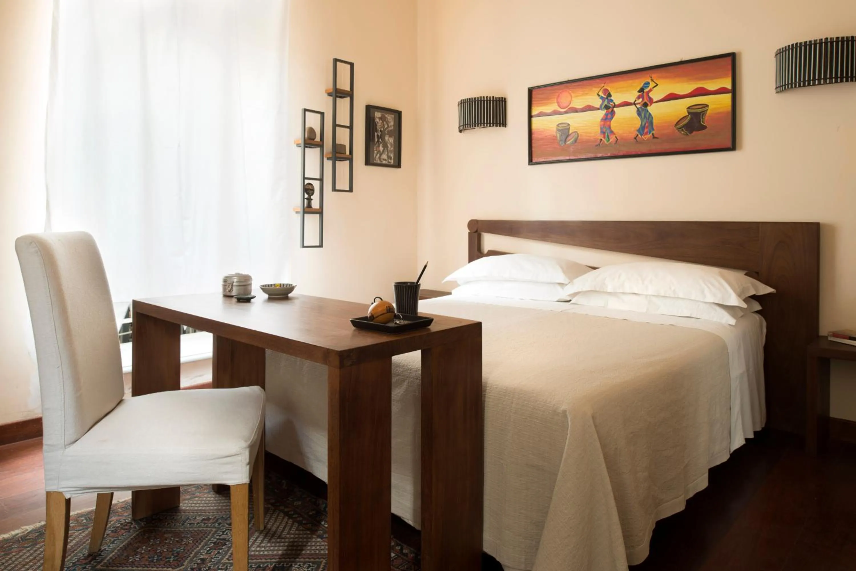 Bed in Palm Gallery Hotel