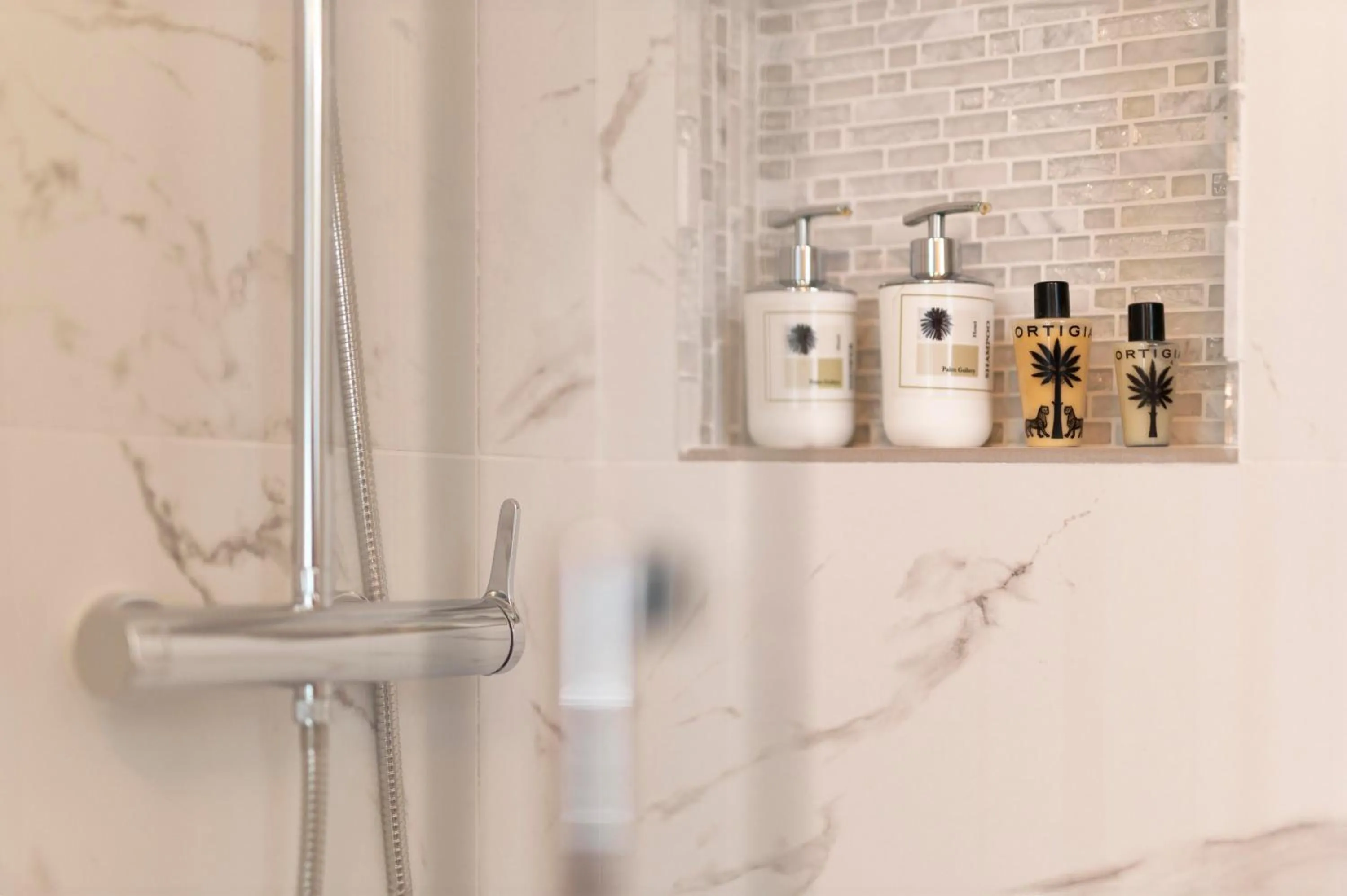 Bathroom in Palm Gallery Hotel