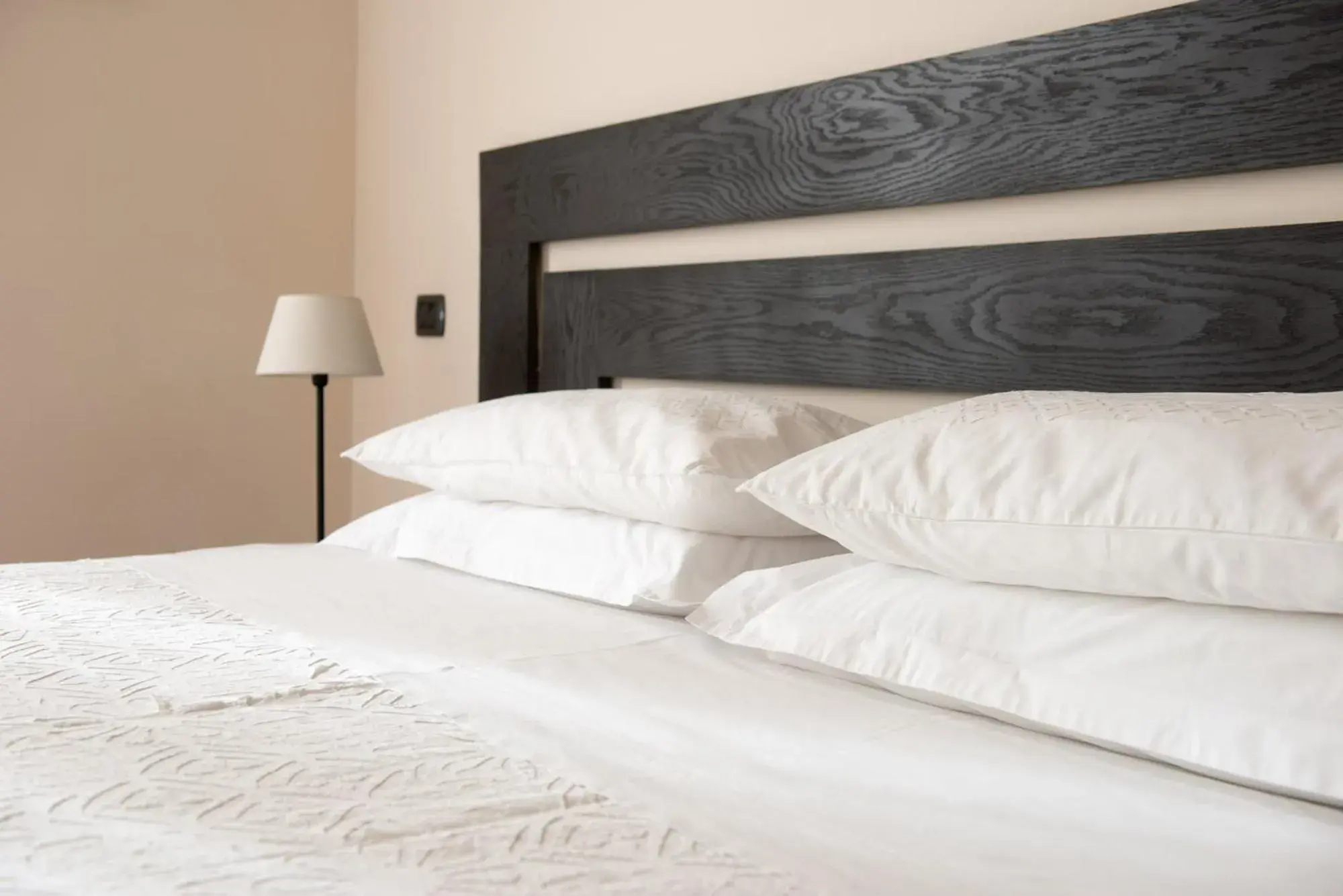 Bed in Palm Gallery Hotel Bed in Palm Gallery Hotel