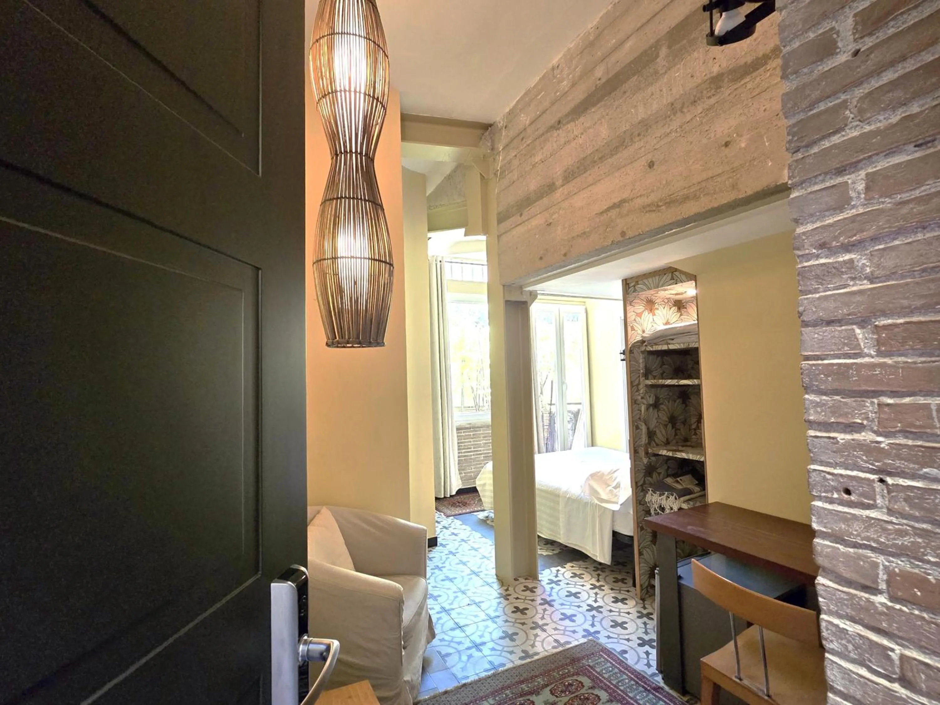 Bedroom in Palm Gallery Hotel