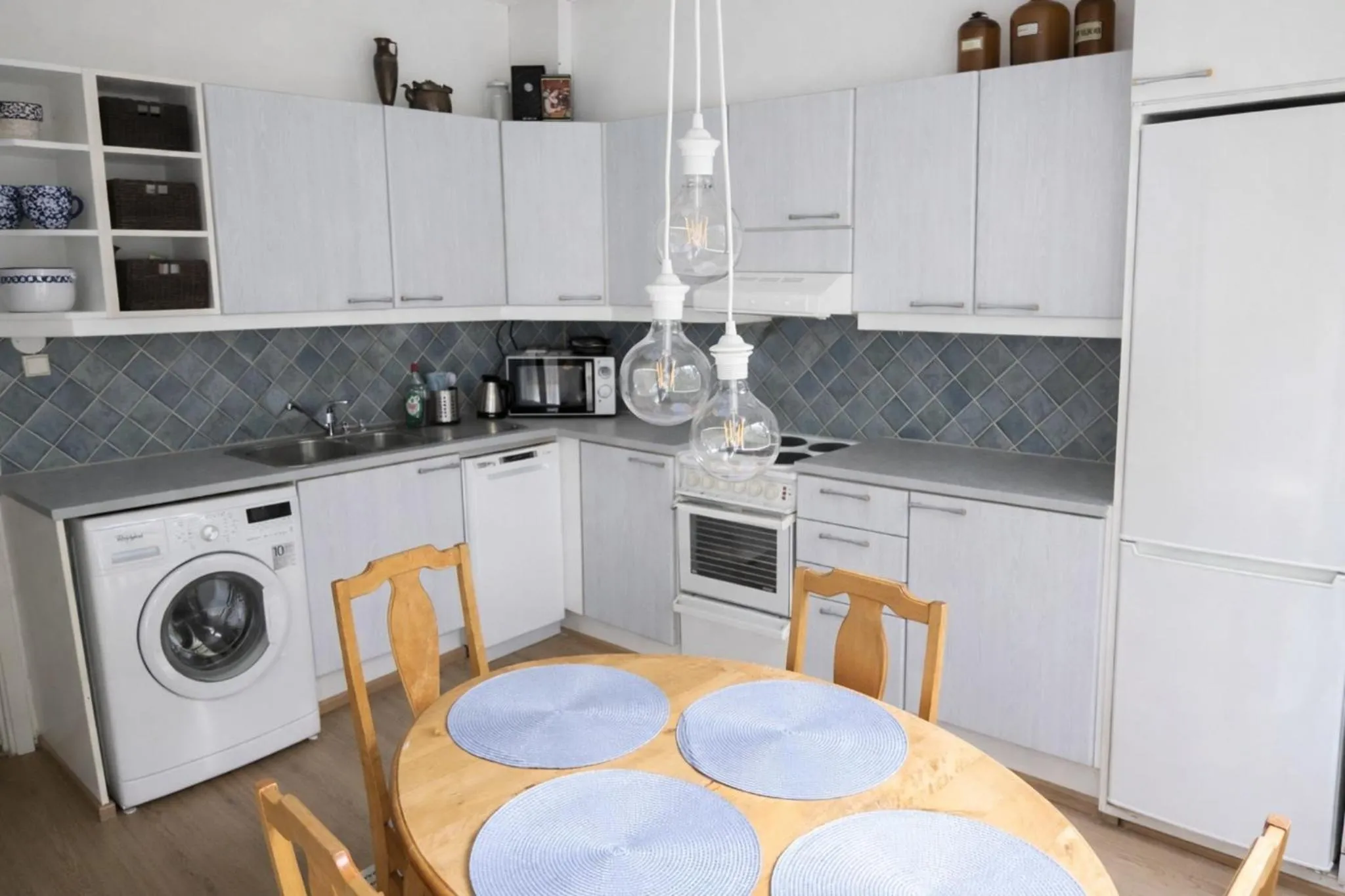 Kitchen or kitchenette in 1-Bedroom Apartment with Sauna