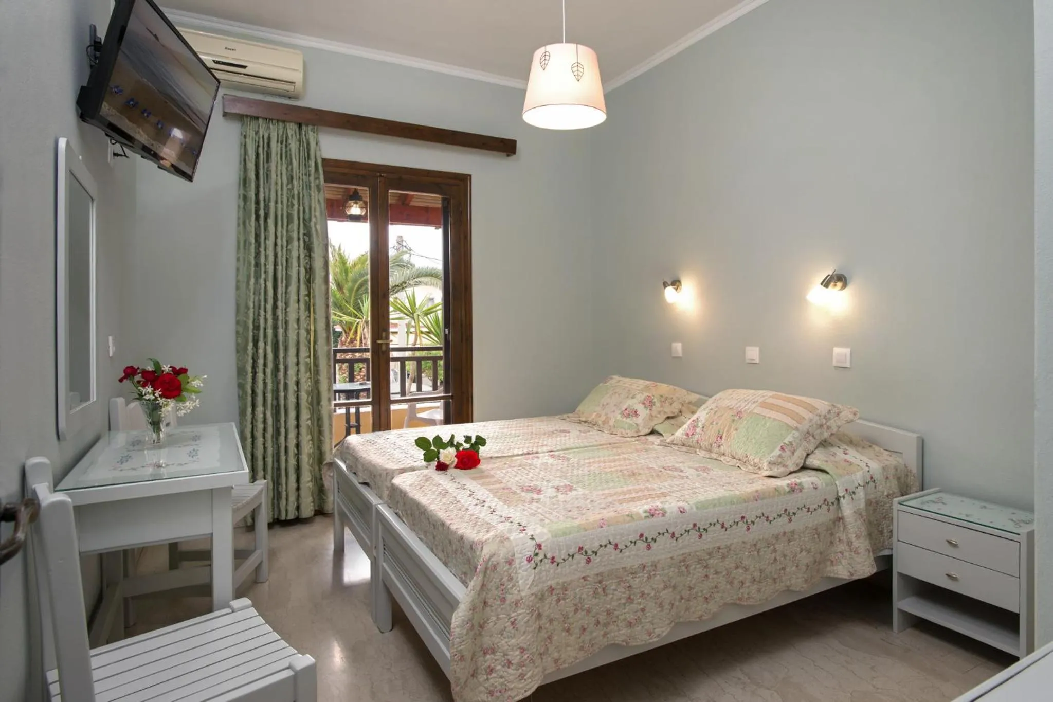Bed in Eleni Apartments