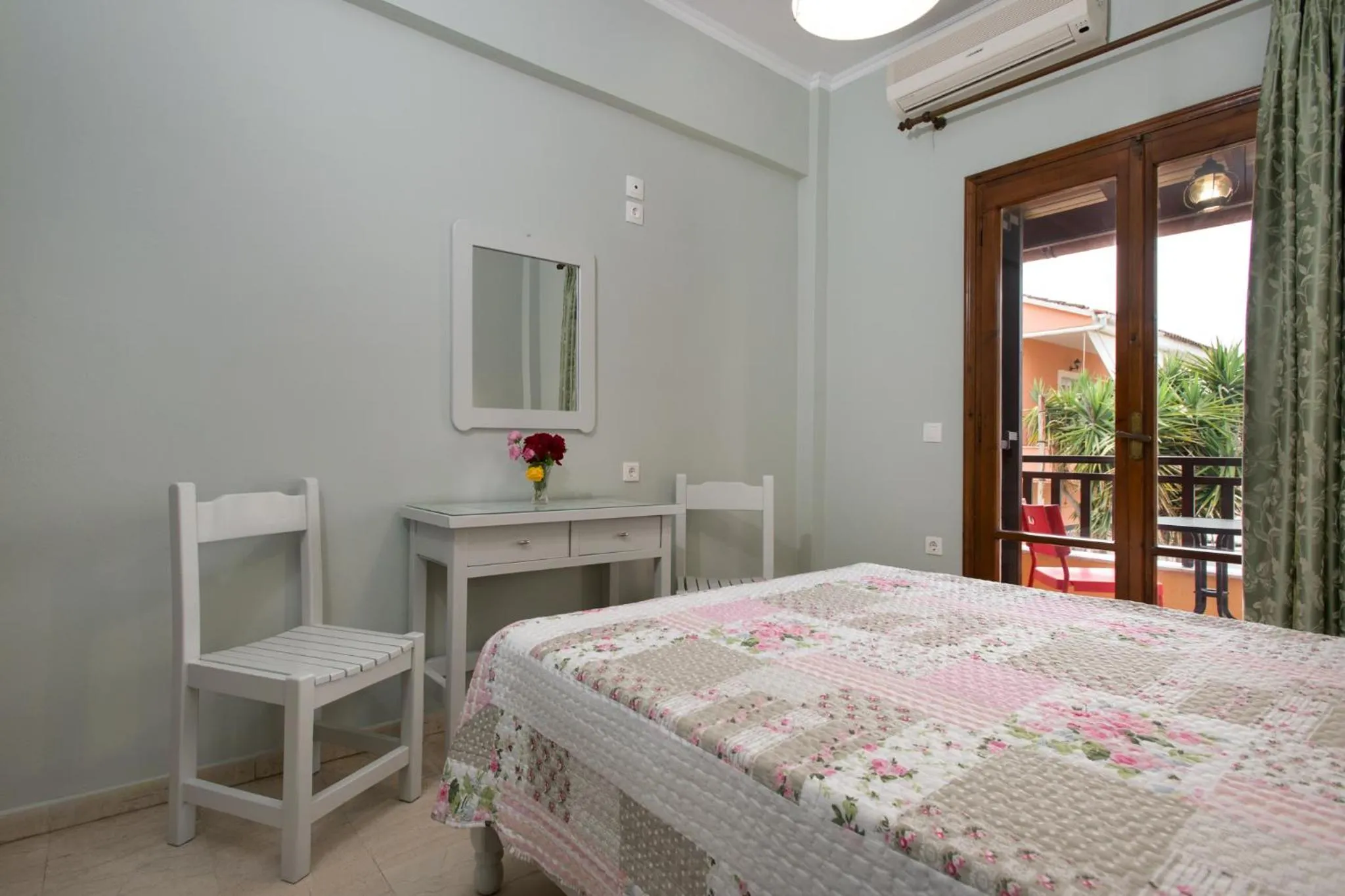 Bed in Eleni Apartments