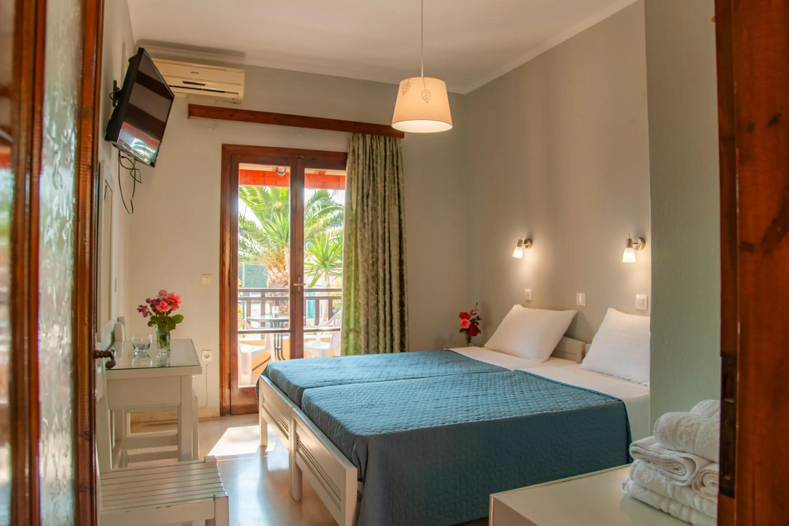Bed in Eleni Apartments