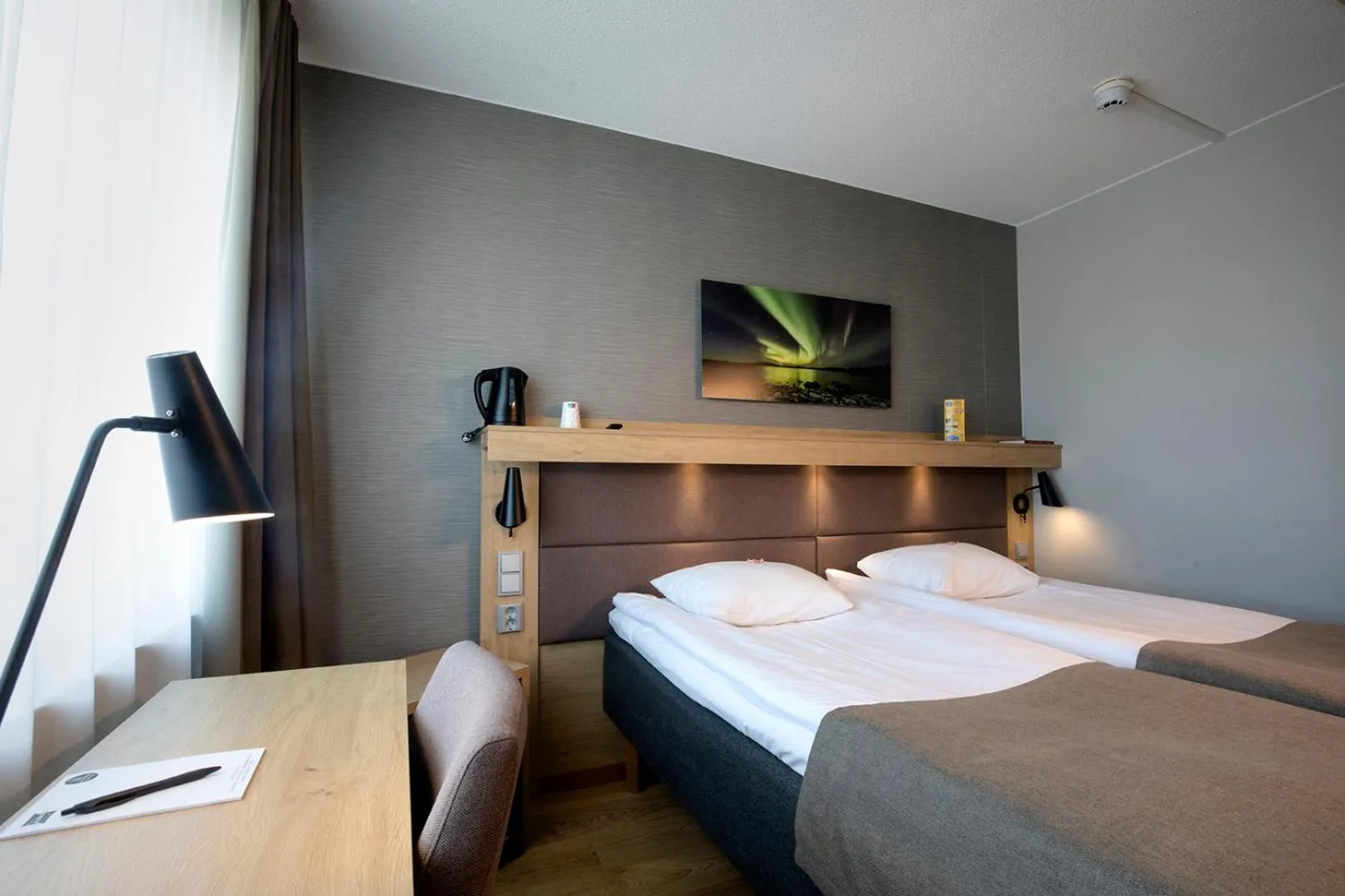 Photo of the whole room, Bed in Hotelli Toivola