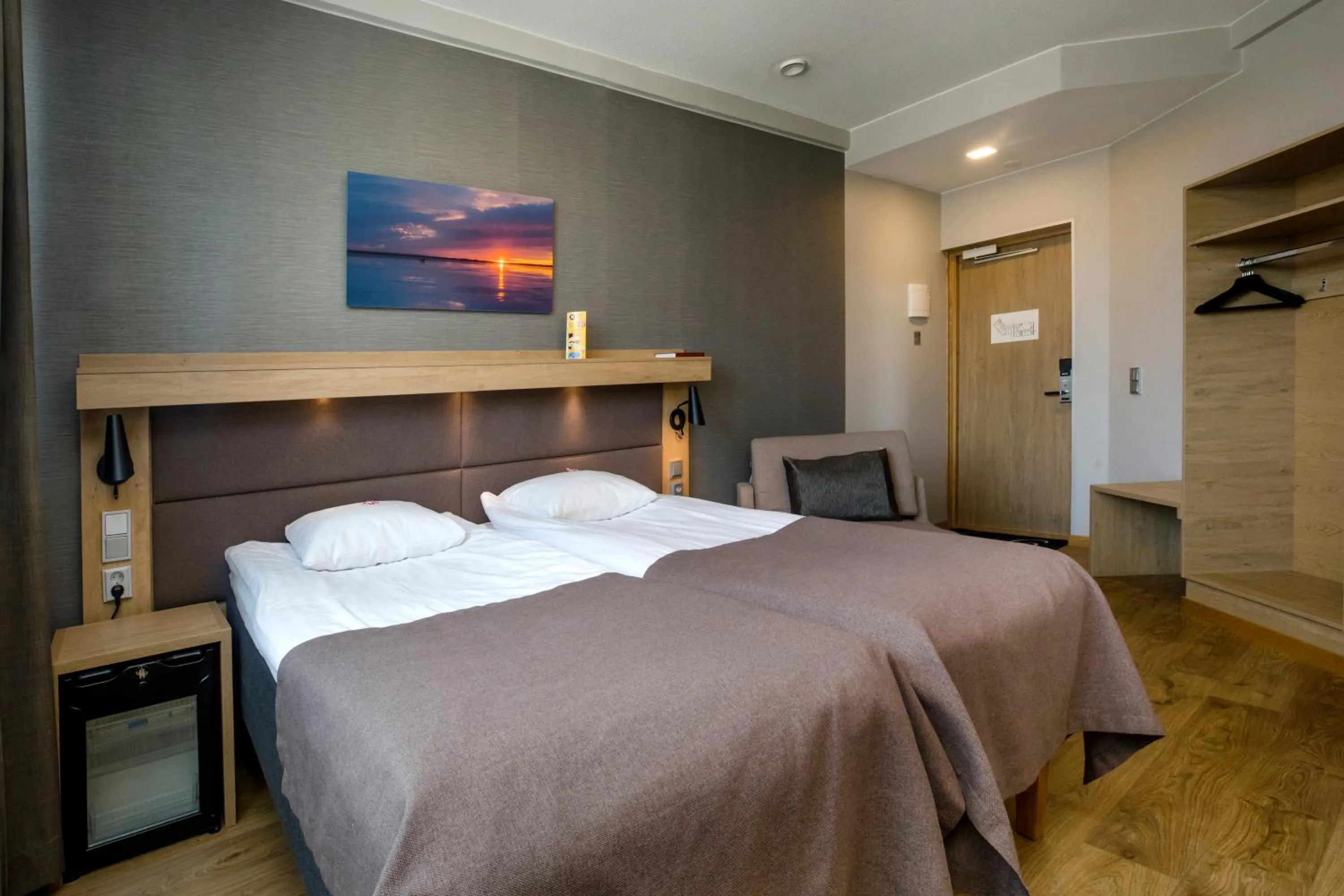 Photo of the whole room, Bed in Hotelli Toivola