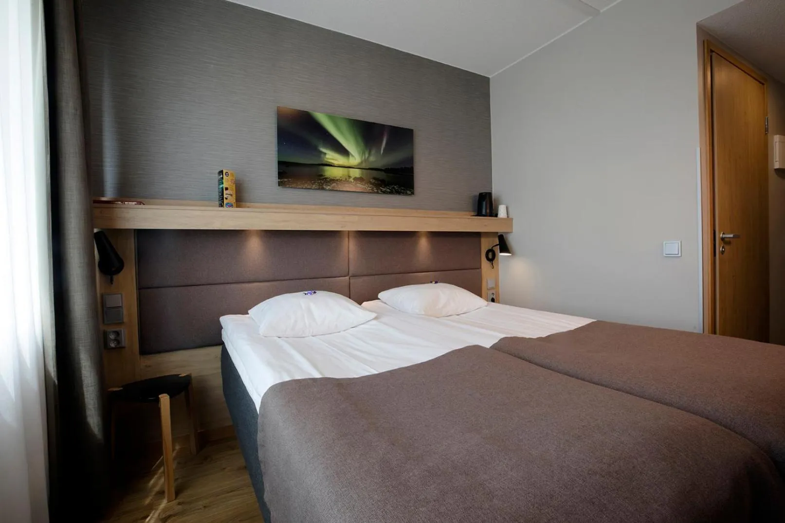 Photo of the whole room, Bed in Hotelli Toivola